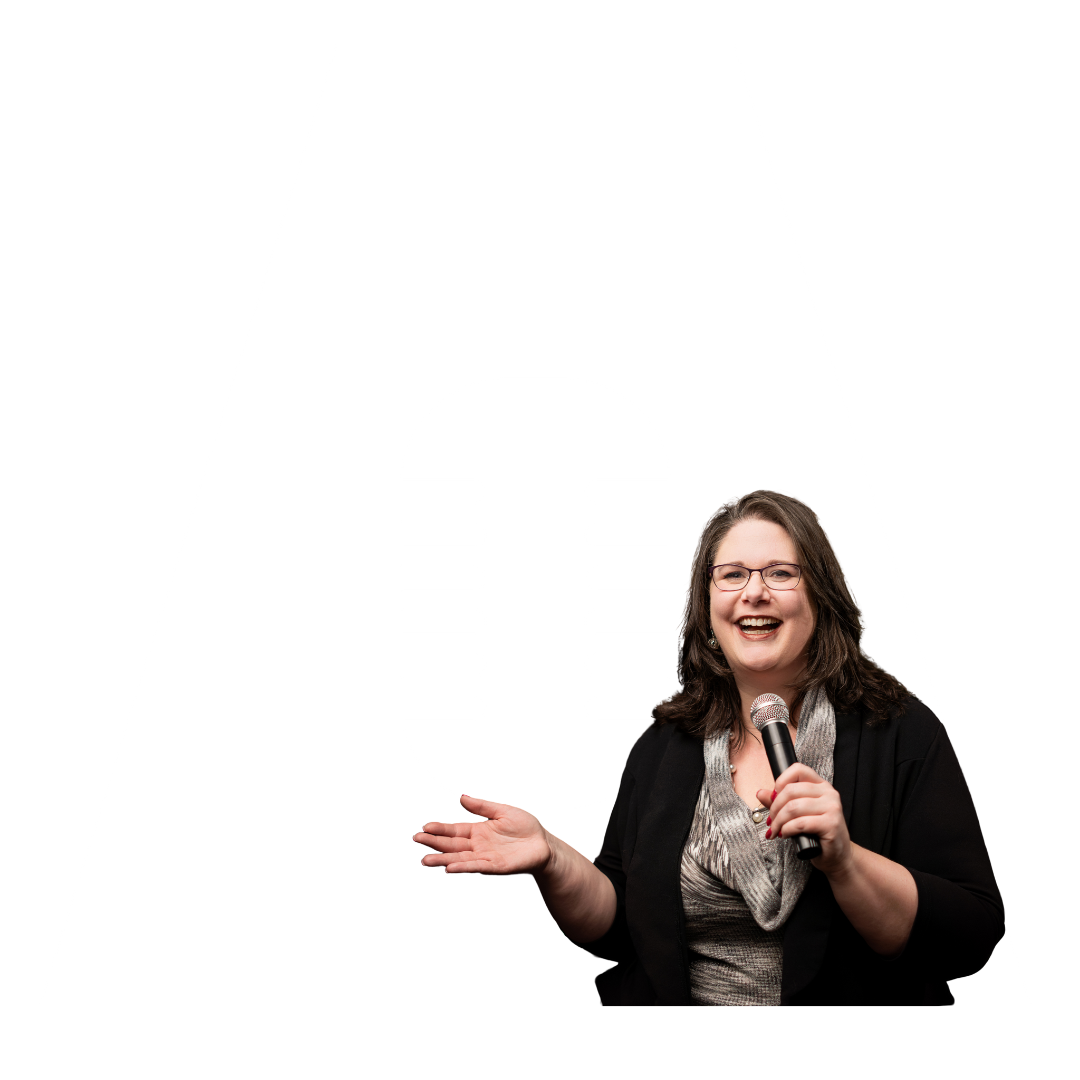 Lauren Ansley, conference speaker, smiling and speaking into a microphone during a presentation or speech.