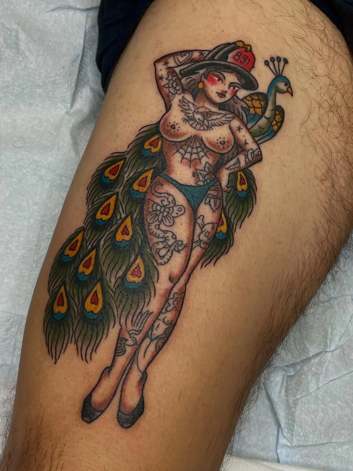 Busty tattooed firefighter pinup with a peacock?! Don&rsquo;t mind if I do 🤗

Thank you, Paul. Looking forward to more!