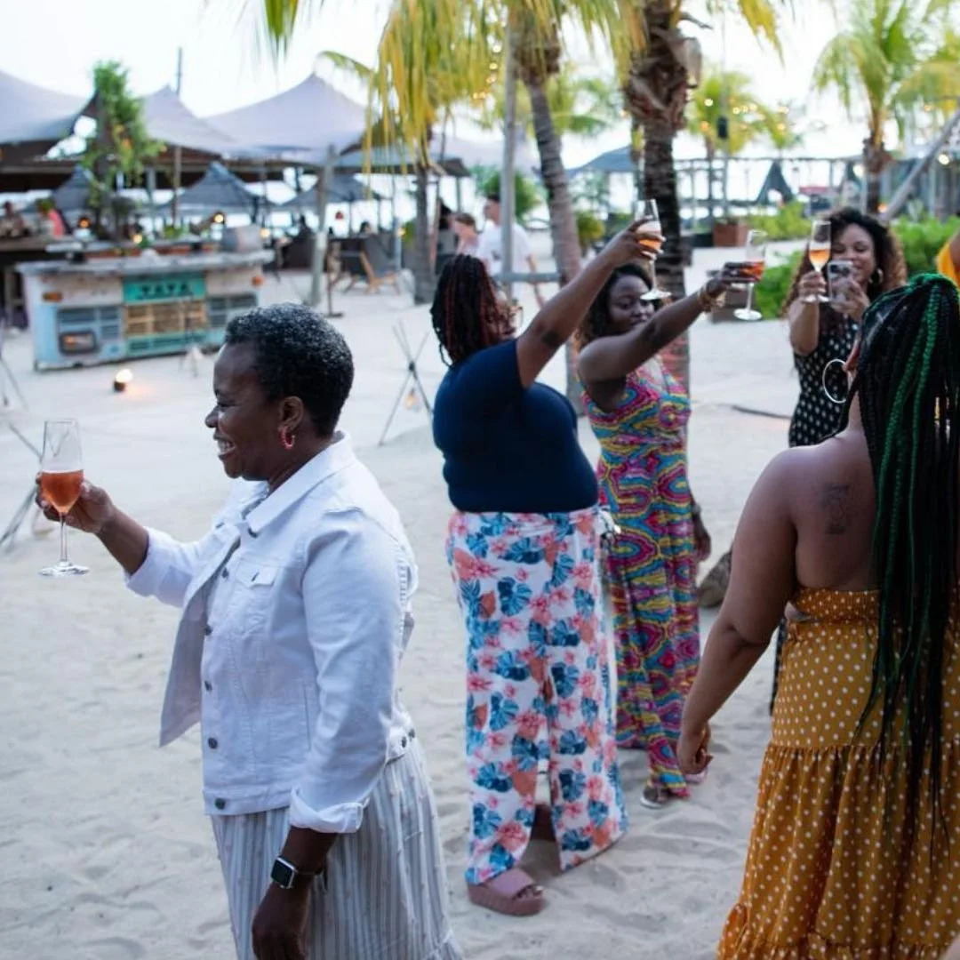 Black Women toasting with Champagne celebrating life