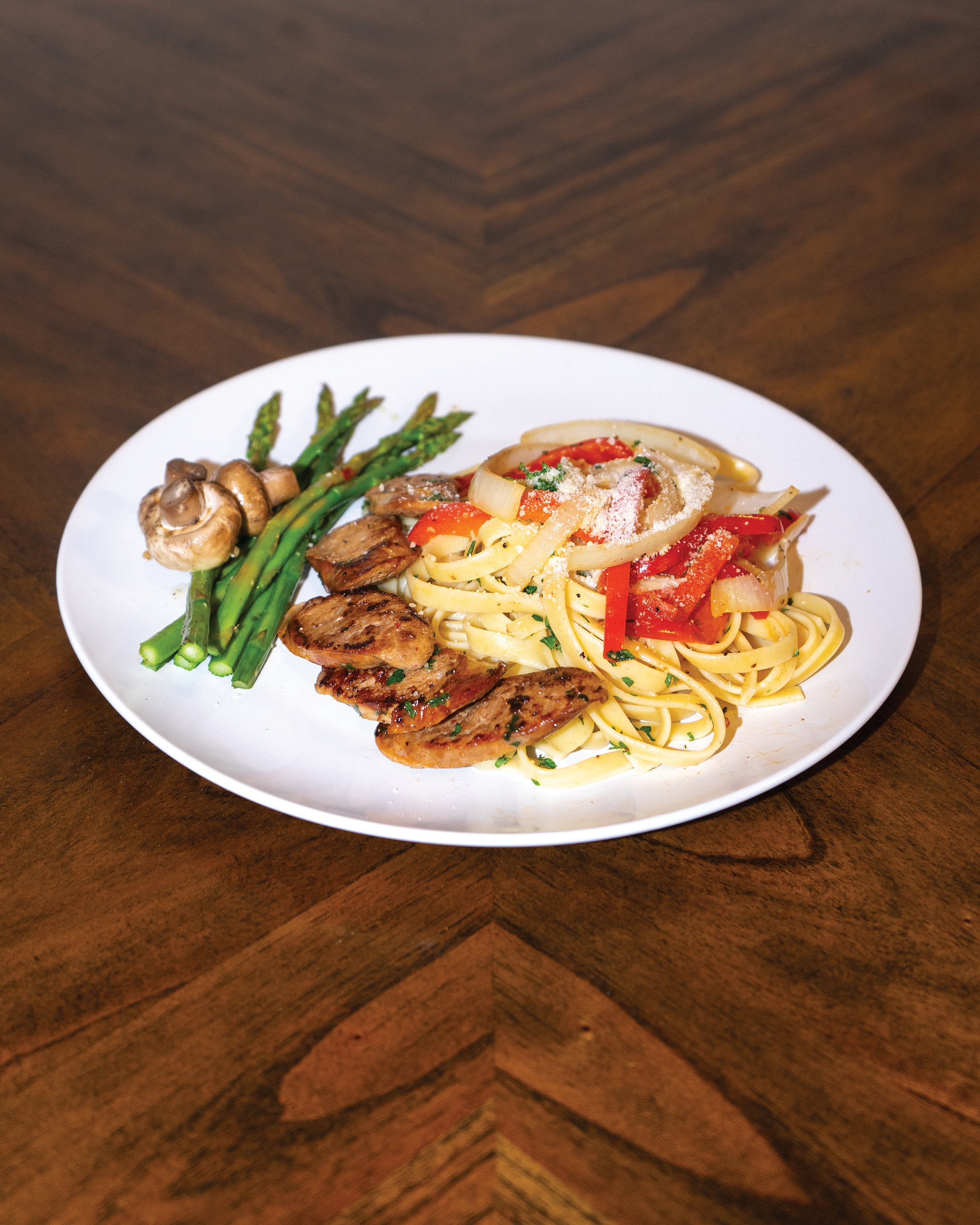 Garlic Pasta, Sausage, Sautéed Mushrooms, Asparagus, Bell pepper, Onion