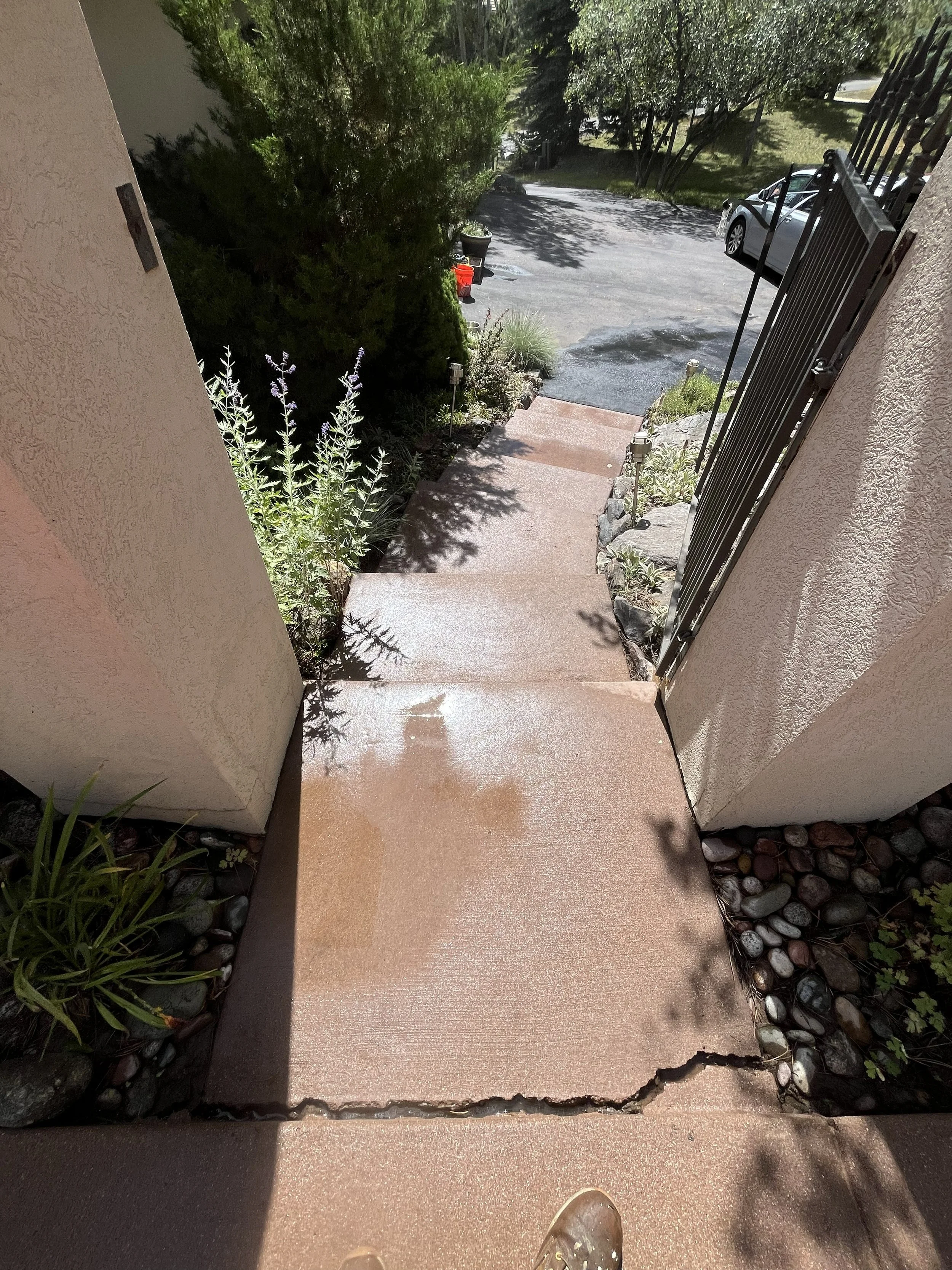 stairs before from top after pressure washed.jpg