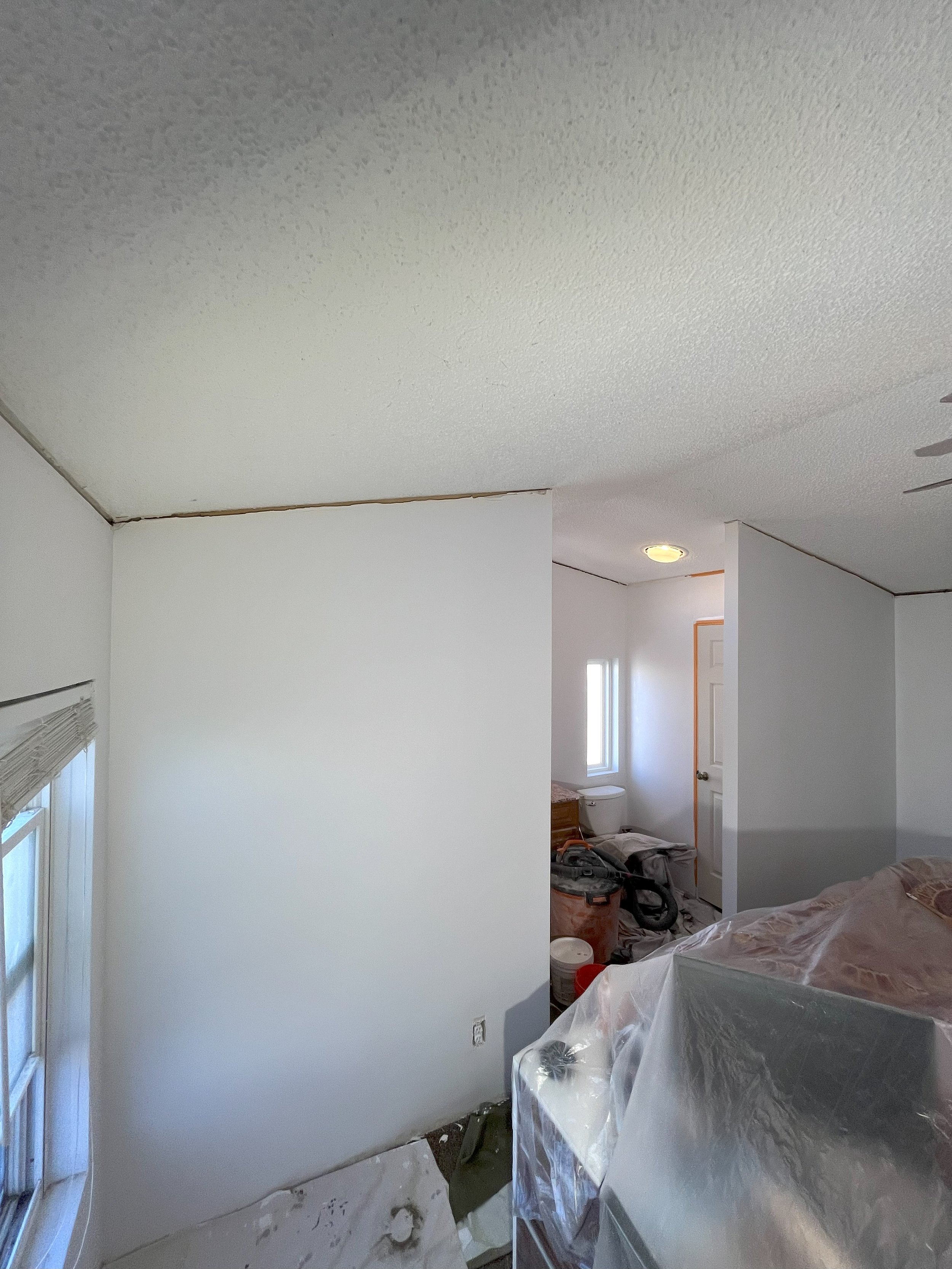 wall with access panel done.jpg