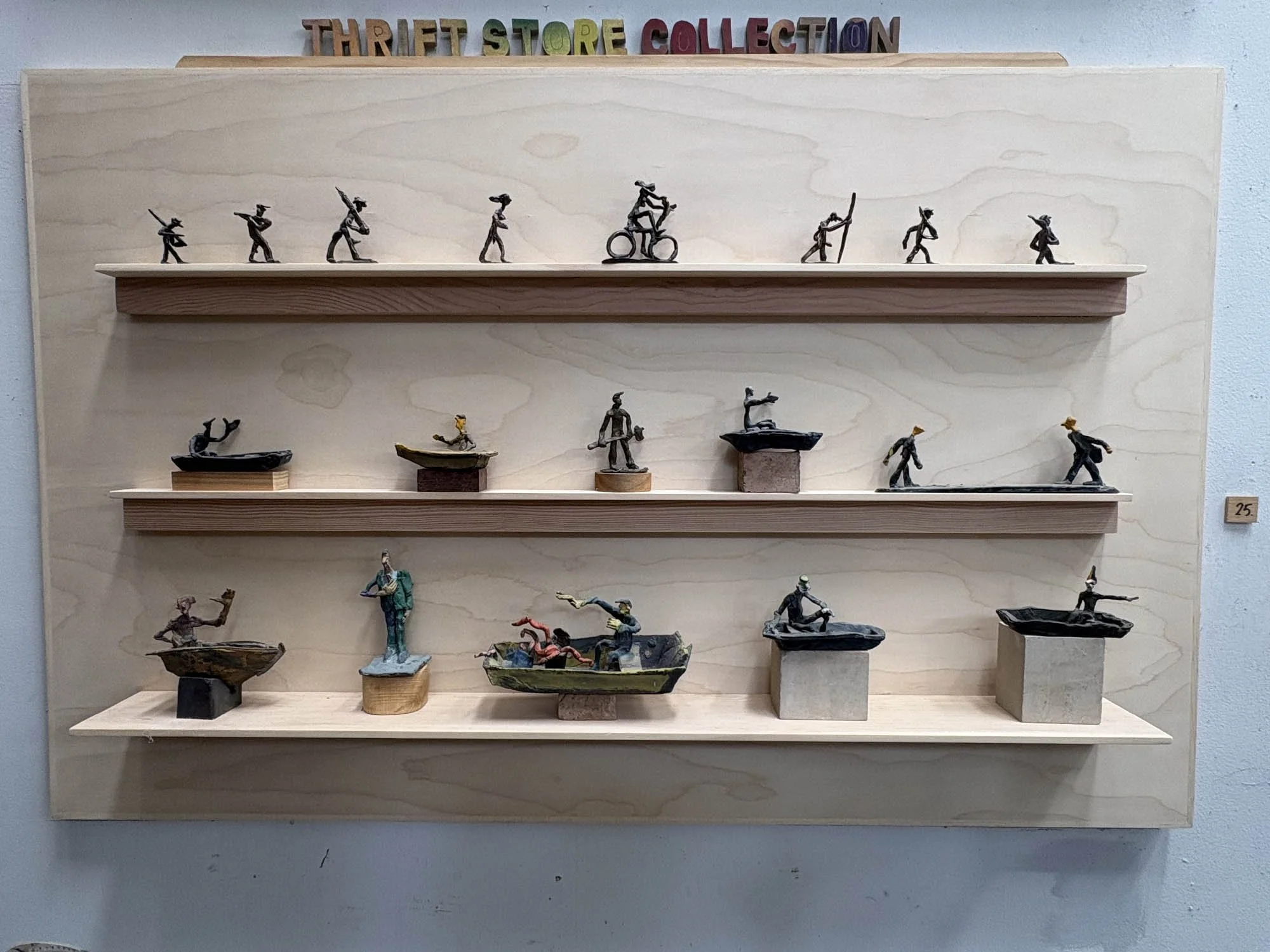 Thrift Store Collection, 1987-2024, 19 bronzes on custom shelf, 33 x 48 x 4.75 in. 