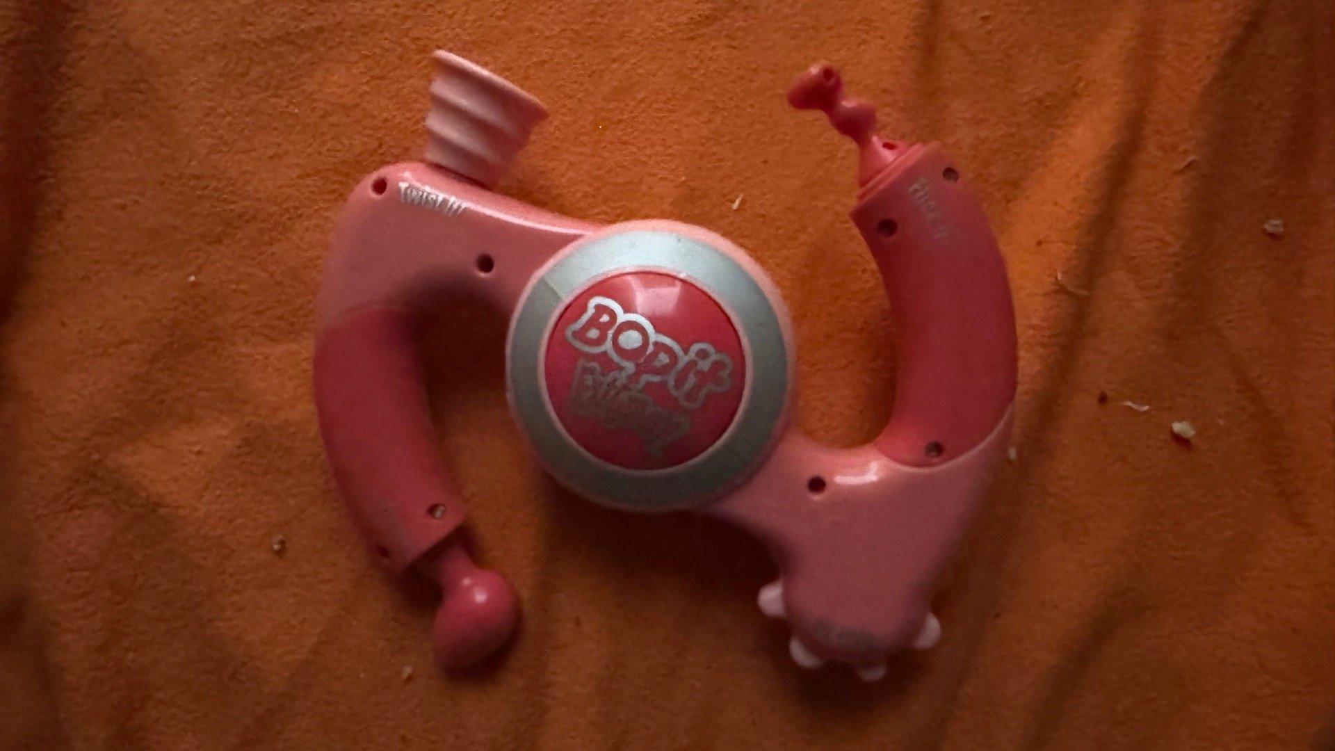 Name: Bop It Extreme 2  •  Color: Pink  •  Release Year: 2004  •  Revision Number: 12  •  Test Mode Length: 0m 35s
