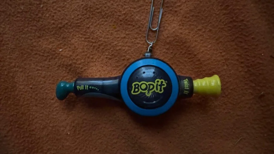 Name: Bop It Keychain  •  Release Year: 2004  •  Revision Number: Unknown  •  Test Mode Length: Unknown