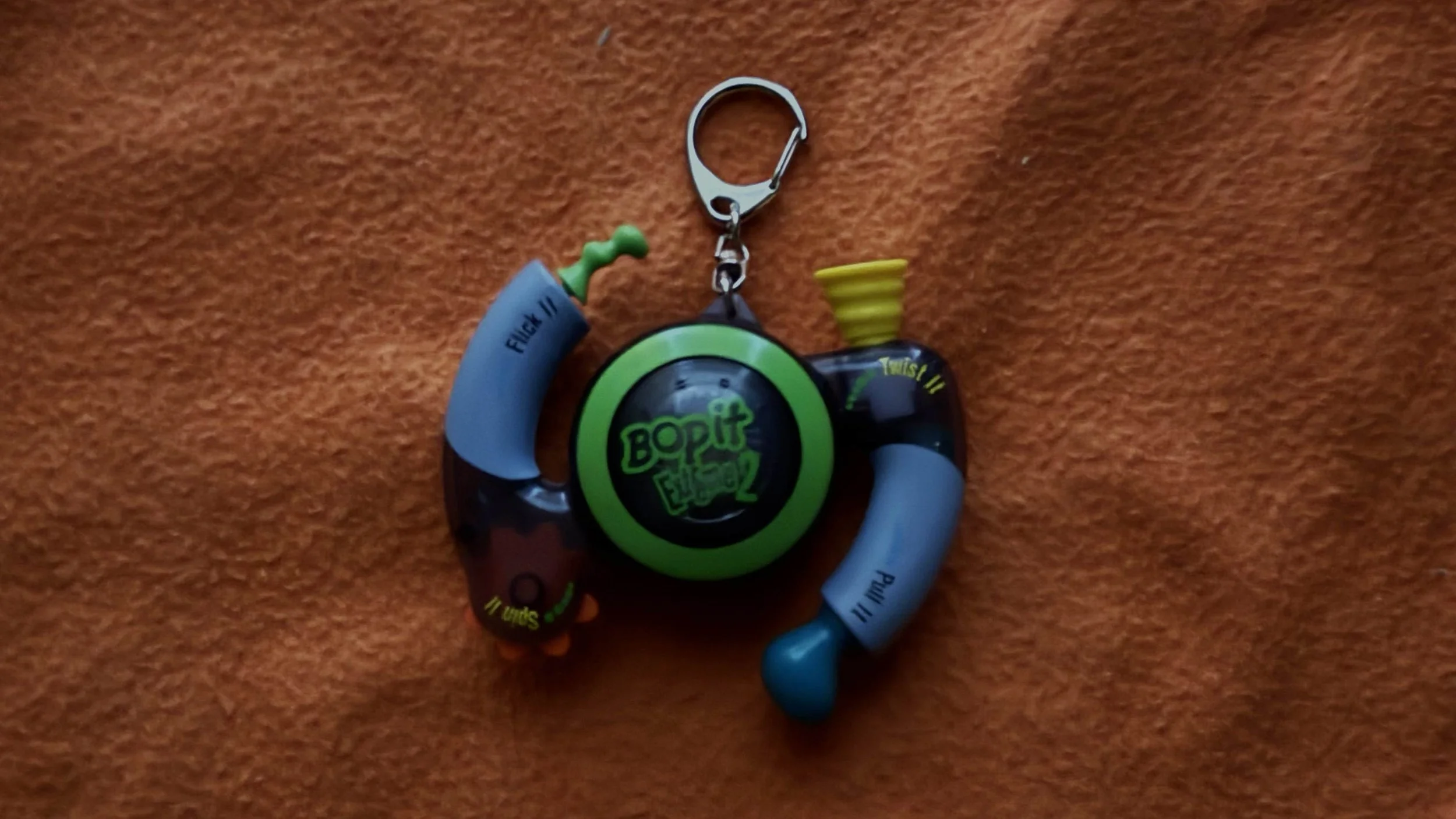 Name: Bop It Extreme 2 Keychain  •  Release Year: 2004  •  Revision Number: 8  •  Test Mode Length: 1m 06s