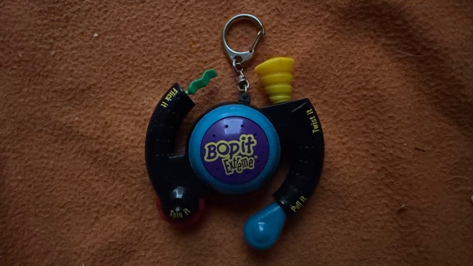 Name: Bop It Extreme Keychain  •  Release Year: 2003  •  Revision Number: 2  •  Test Mode Length: 0m 31s