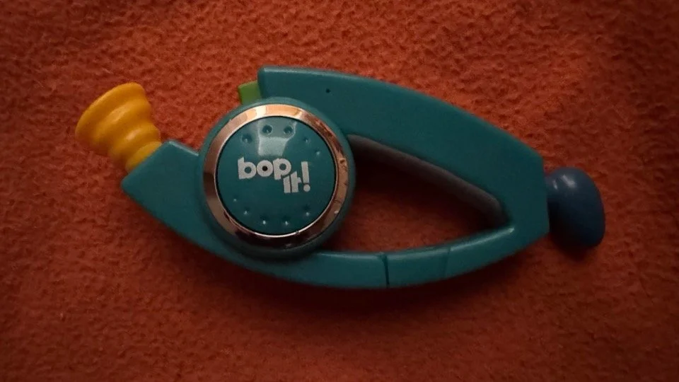 Name: Bop It! Carabiner Edition  •  Color: Blue  •  Release Year: 2012  •  Revision Number: Score 4  •  Test Mode Length: 0m 26s