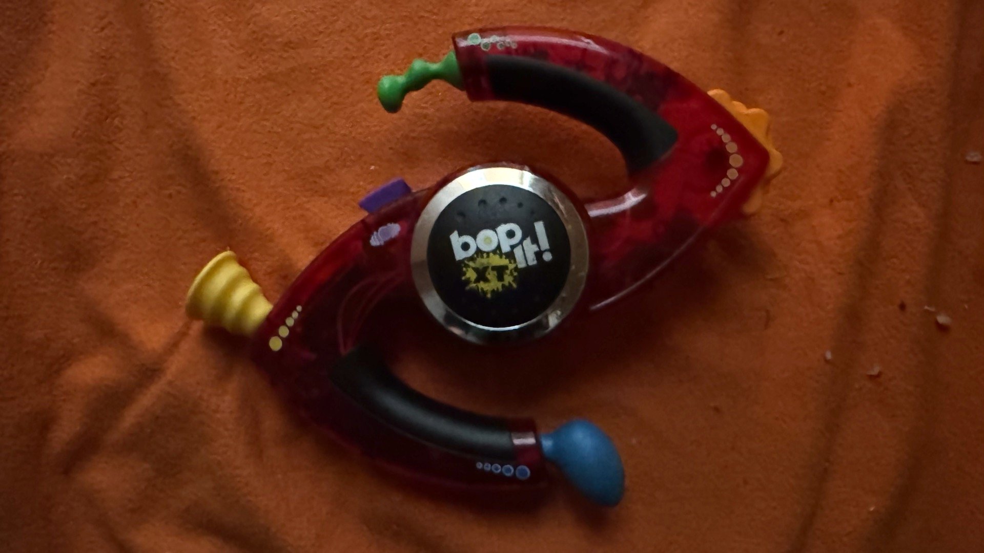 Name: Bop It! XT  •  Color: Caliente Edition  •  Release Year: 2012  •  Revision Number: Score 28  •  Test Mode Length: 1m 22s