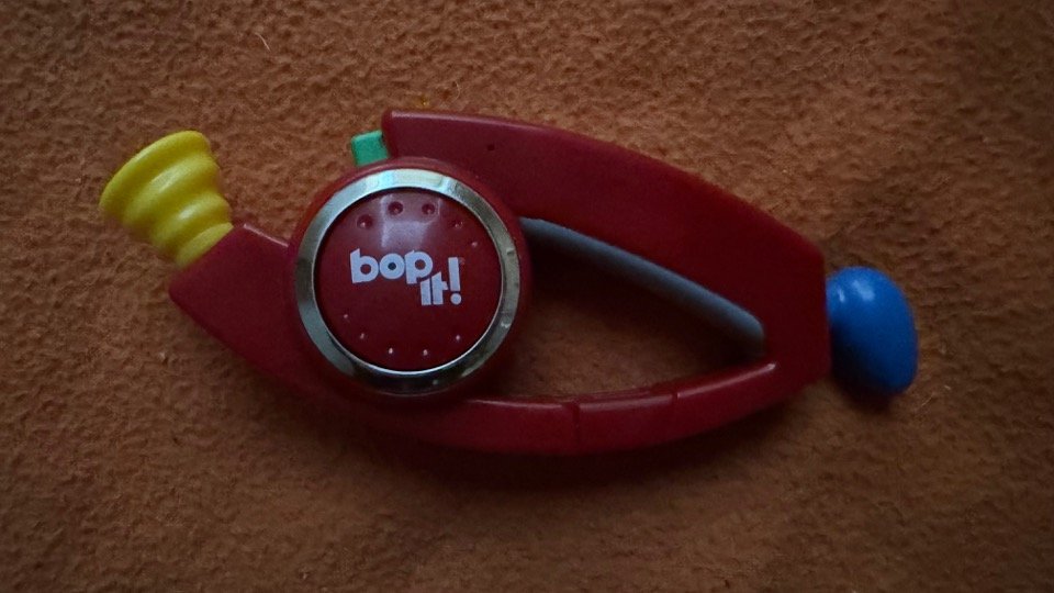 Name: Bop It! Carabiner Edition  •  Color: Red  •  Release Year: 2012  •  Revision Number: Score 4  •  Test Mode Length: 0m 26s