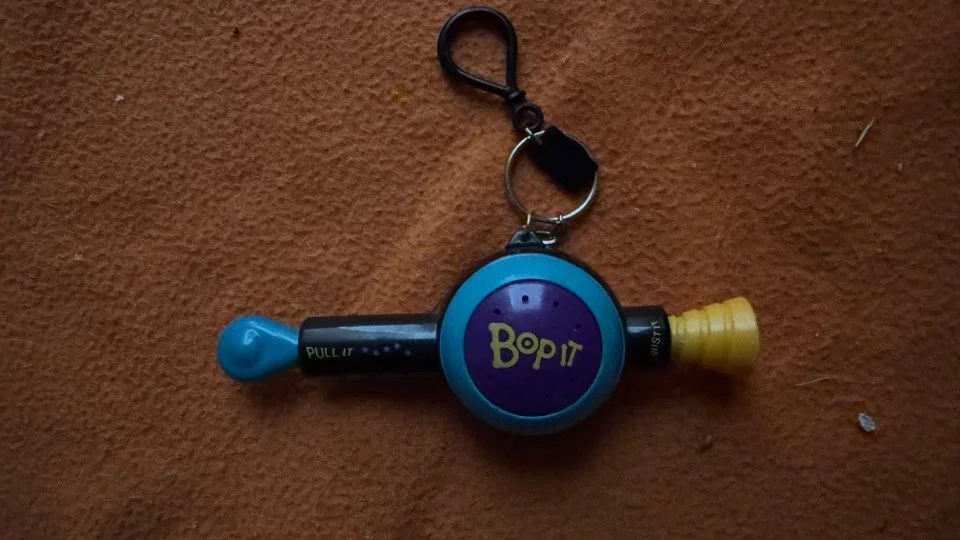 Name: Bop It Keychain  •  Release Year: 2000  •  Revision Number: 5  •  Test Mode Length: 1m 07s