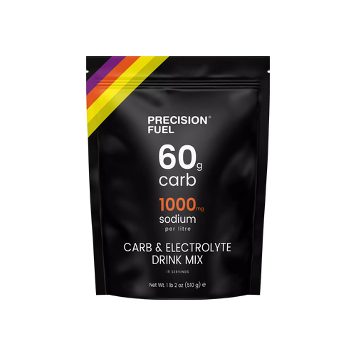 Black package of Precision Fuel carb and electrolyte drink mix with a multicolored diagonal stripe in purple, red, yellow, and orange at the top left corner. Text indicates 60 grams of carbs, 1000 milligrams of sodium per liter, and contains 15 servings.