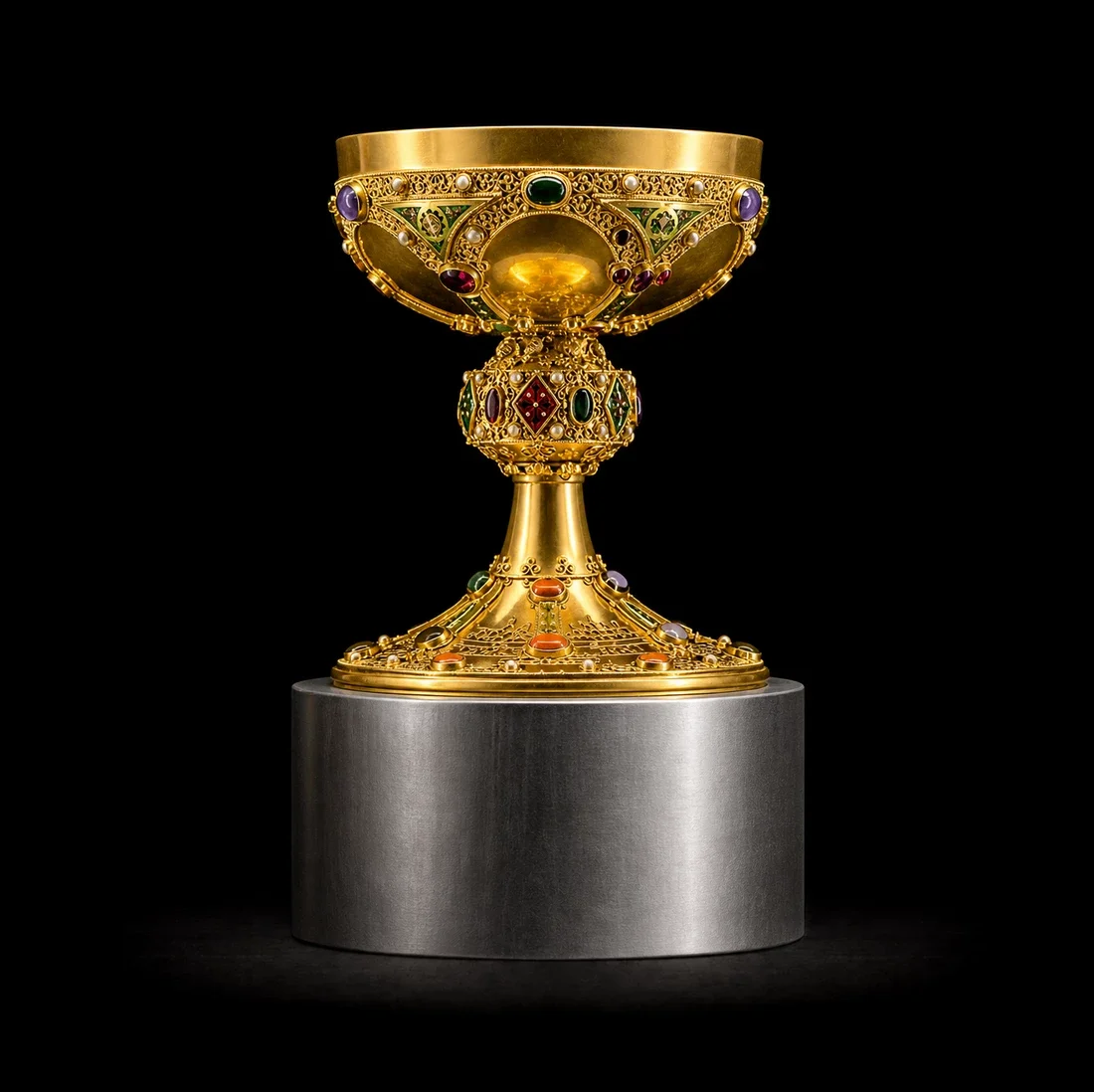  The Sovereign Chalice  
 Overall: 22cm&nbsp; Base: 6cm&nbsp; Object: 16cm   
 18k gold, multi-colored lab-grown gemstones  
 open edition &emsp; Inquire 
