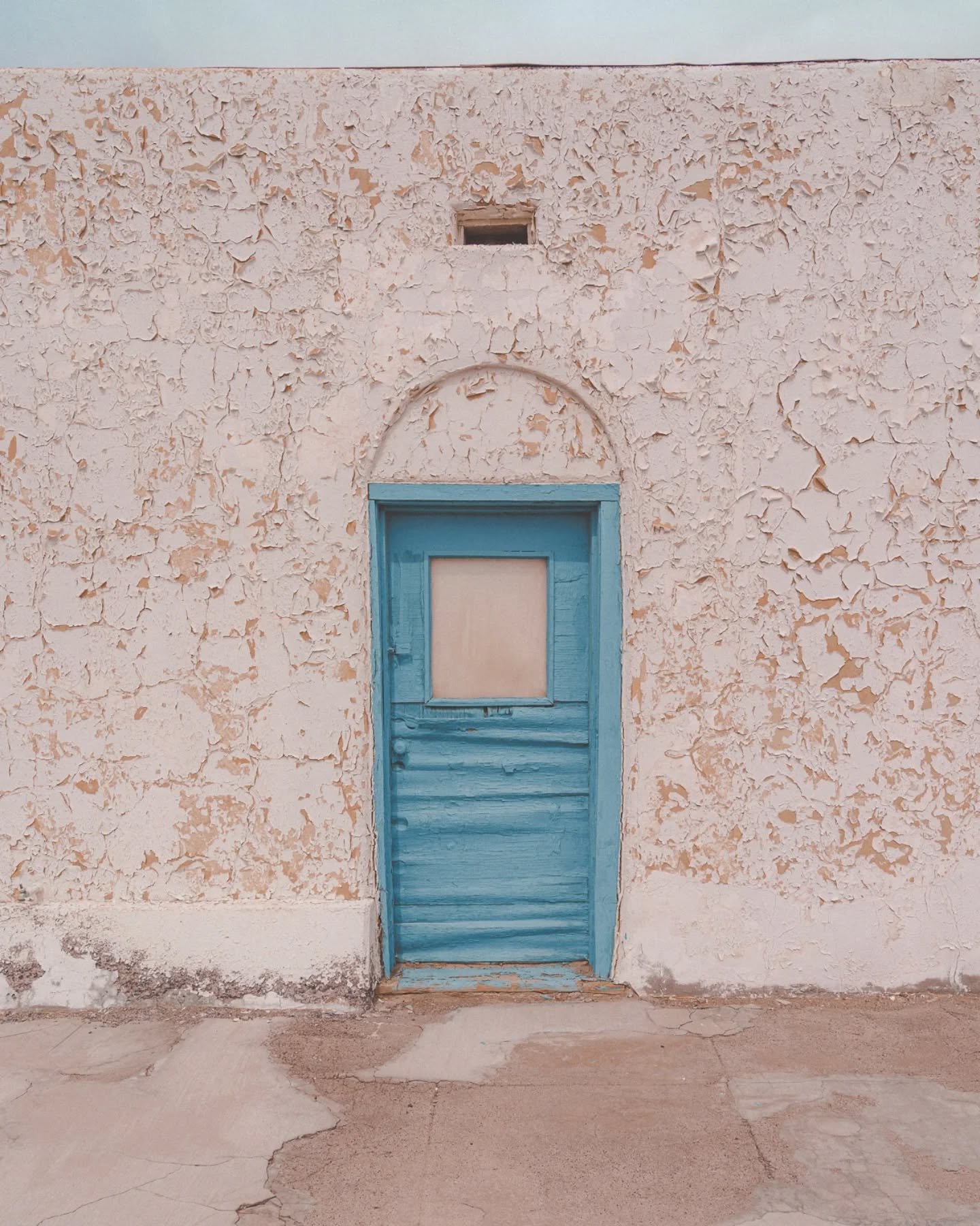 Death Valley Junction - March 2021. I stopped off at the legendary Amargosa Opera House &amp; Hotel and grabbed some photos on my way to Death Valley National Park.

1) Blue door at the Amargosa Opera House &amp; Hotel
2) My car parked off of CA-127 