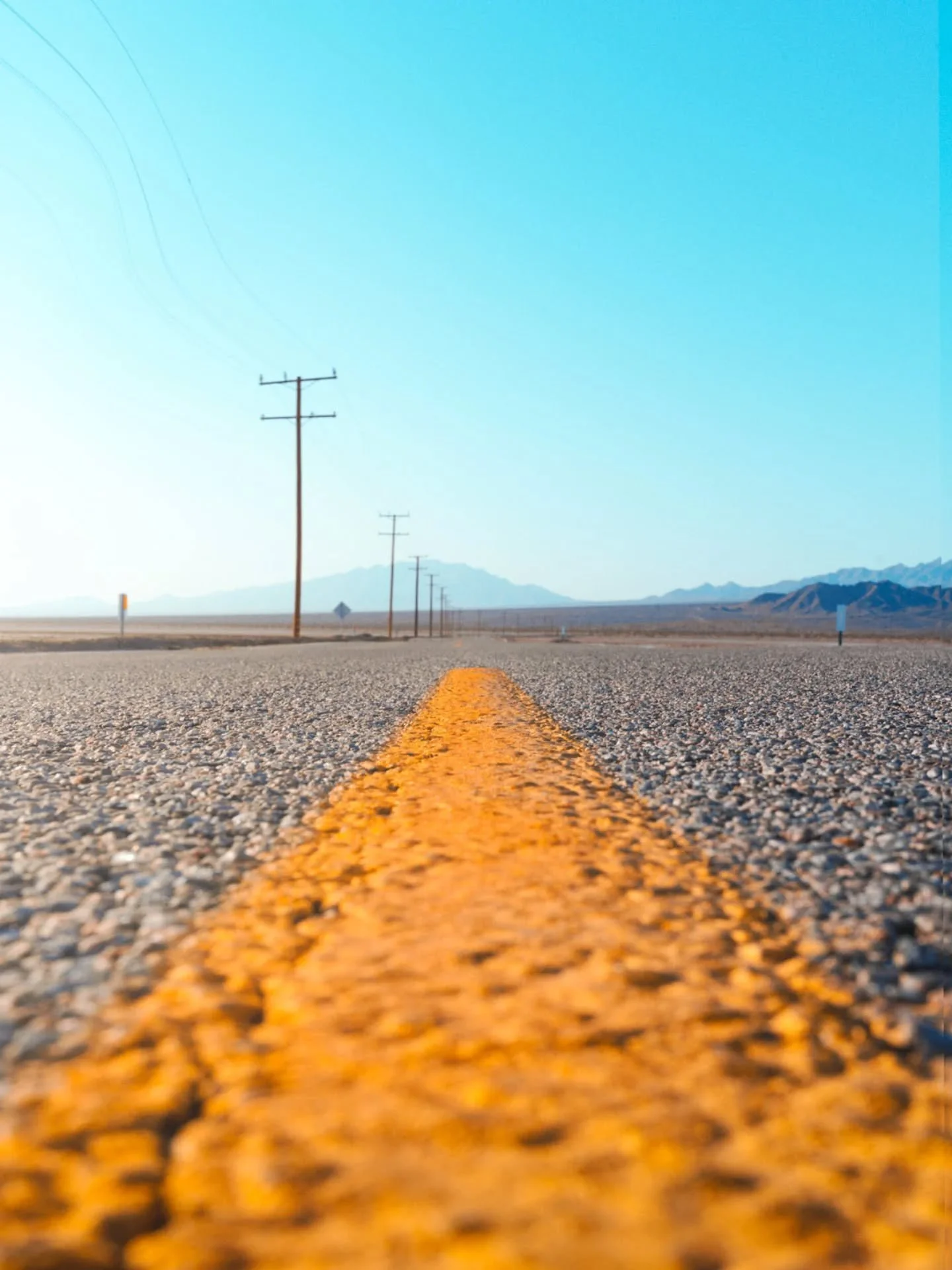 Amboy Road Trip.

Low perspective view of the yellow stripes on the asphalt going down Amboy Road in the Mojave Desert of California.&nbsp;

All safety precautions were taken with this photo. In other words, no cars were coming.

#amboy #amboyroad #a