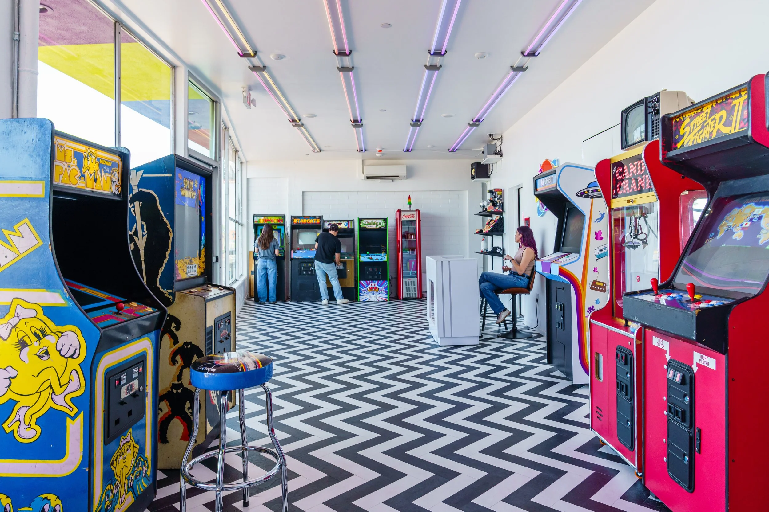 Hi-Orbit Games Arcade with Players During the DAy