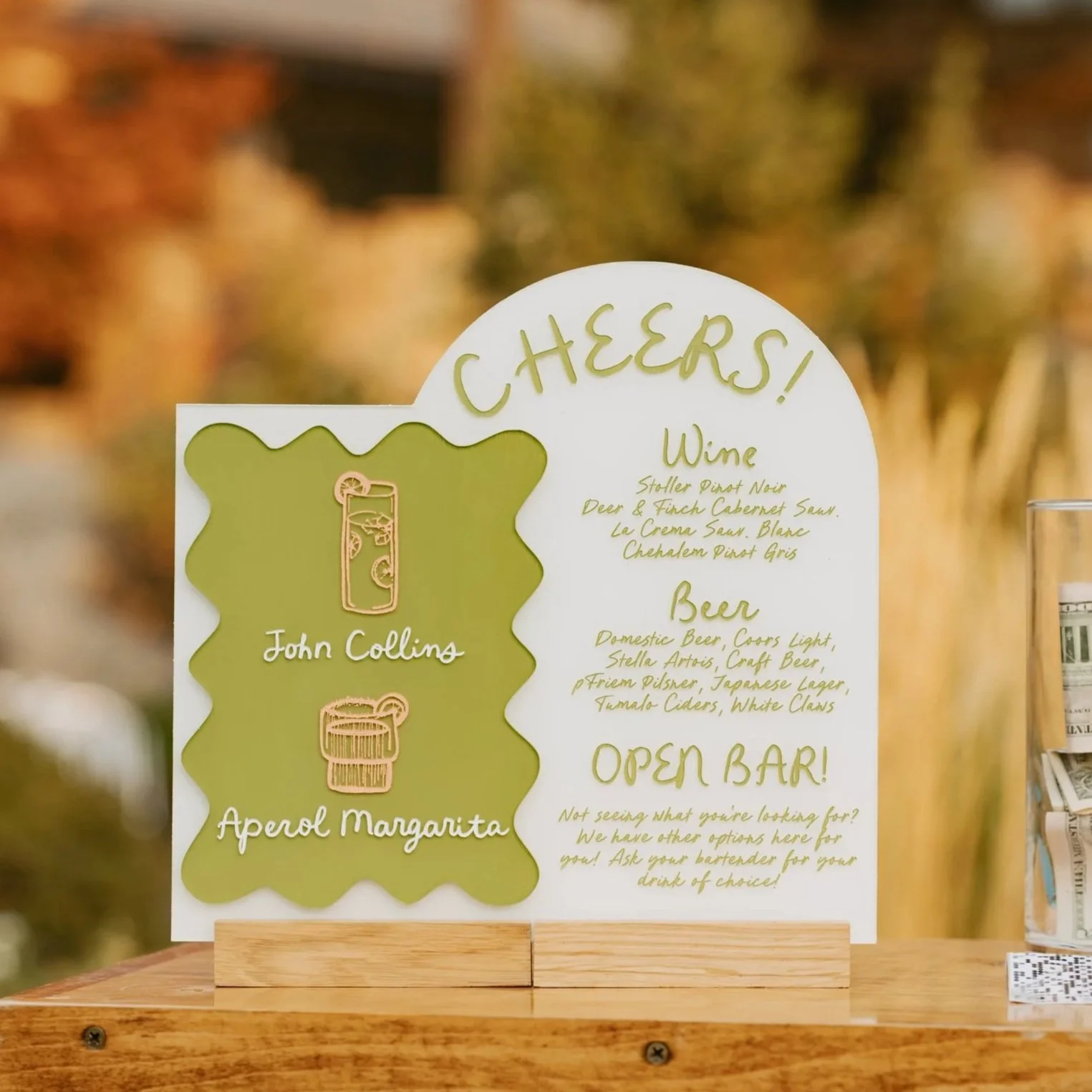 Custom wedding bar sign, colorful and fun design, personalized cocktail menu for weddings, vibrant and funky wedding signage, perfect for wedding receptions in Central Oregon and beyond.