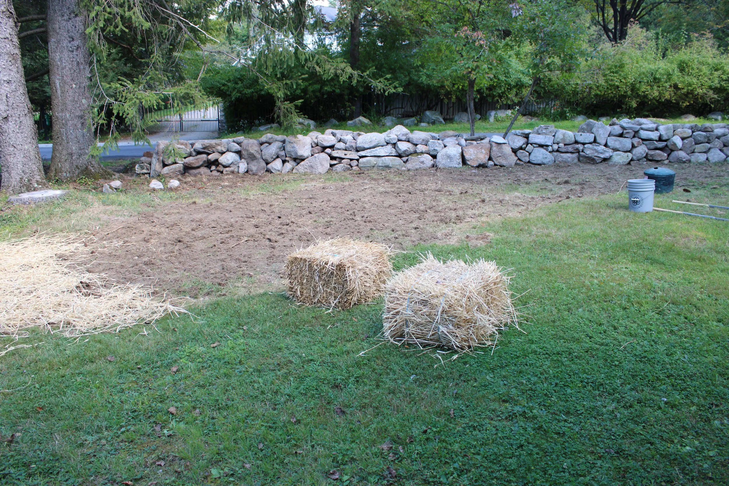 Stone wall installation landscape design Cragsmoor NY Mackenzie Younger 