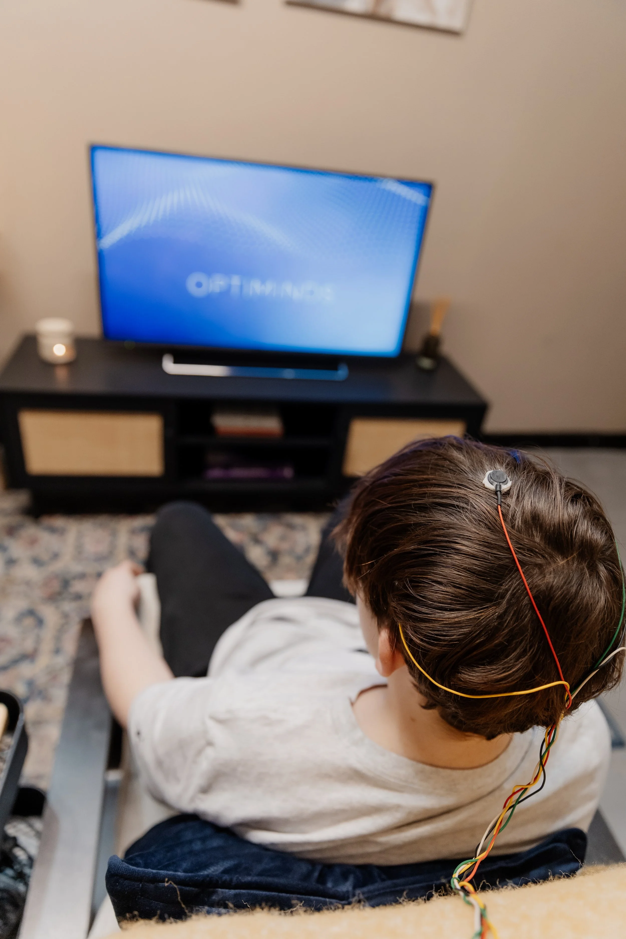 teenage boy getting ready to start neurofeedback session