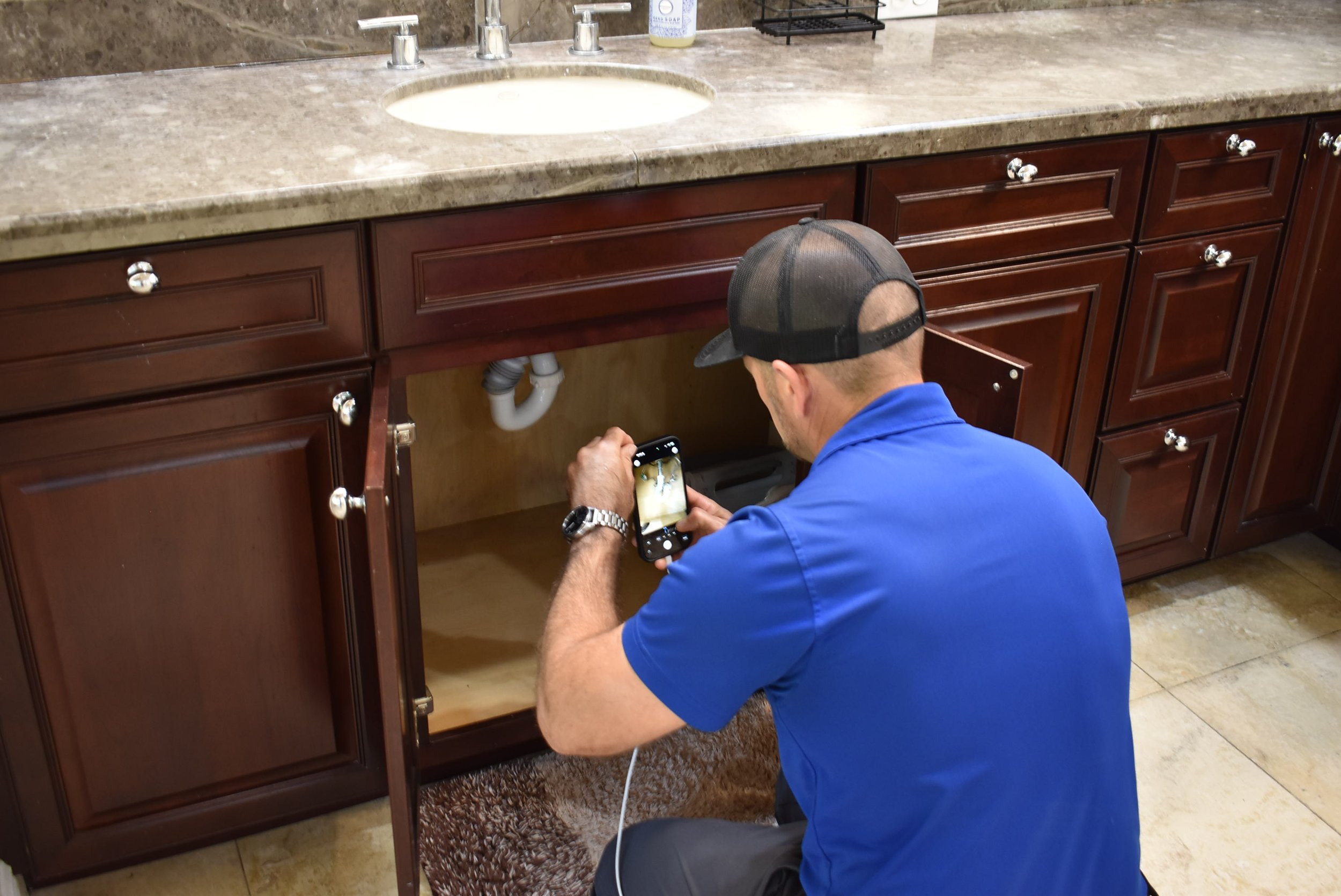 inspecting the plumbing