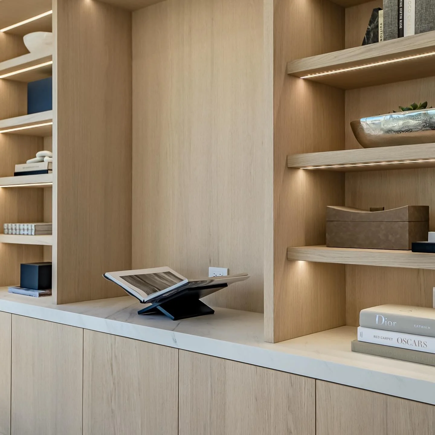 Designed, fabricated, and installed by Madley Fine Cabinetry.

This white oak home office is a study in restraint and precision. Every element was built in house to create a seamless, architectural environment where nothing feels excessive and everyt