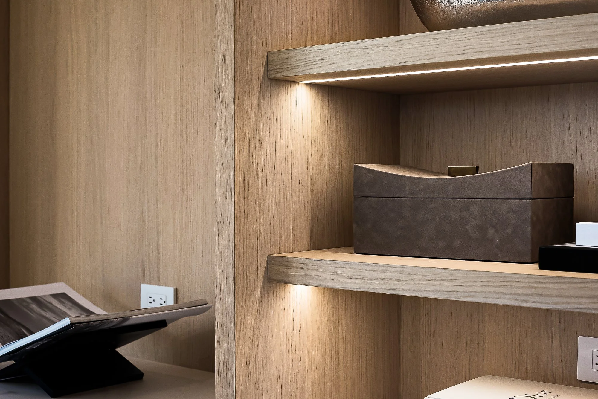 Modern white oak office with bookshelves and integrated desk