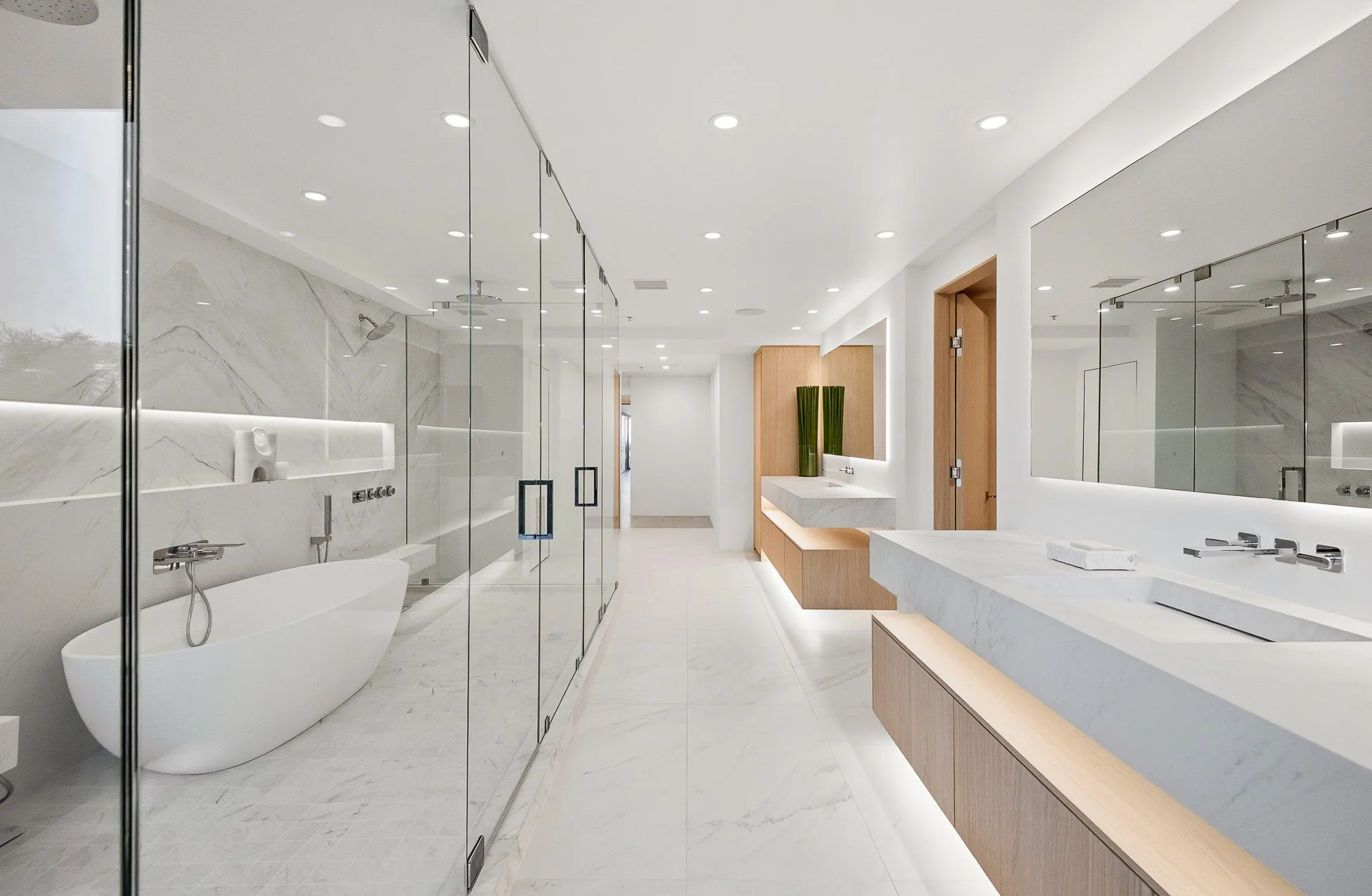Custom-built white oak floating vanity by Madley Fine Cabinetry