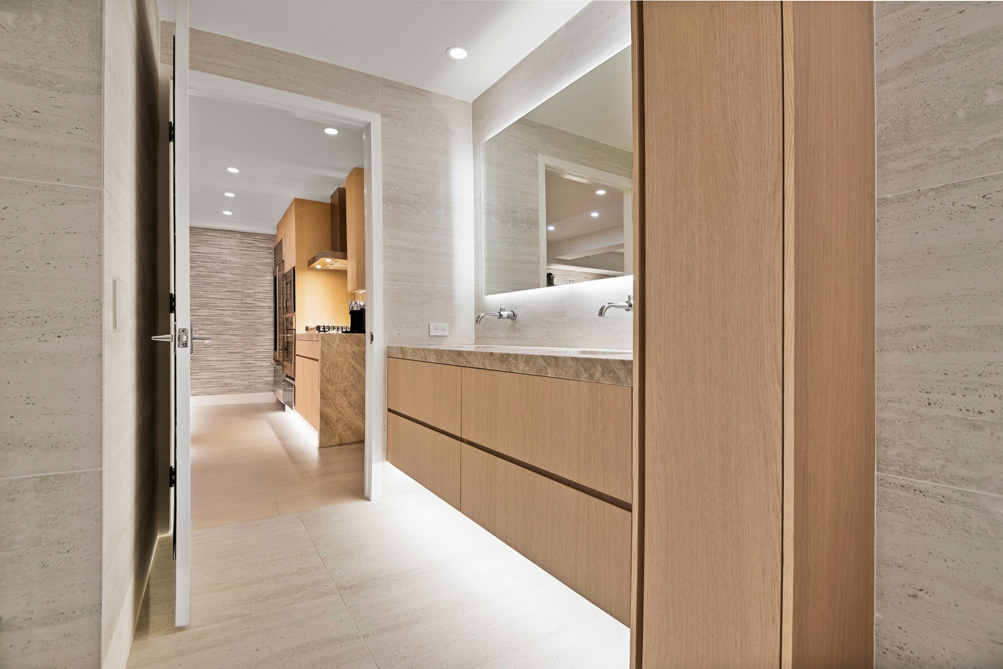 Custom-built white oak floating vanity by Madley Fine Cabinetry