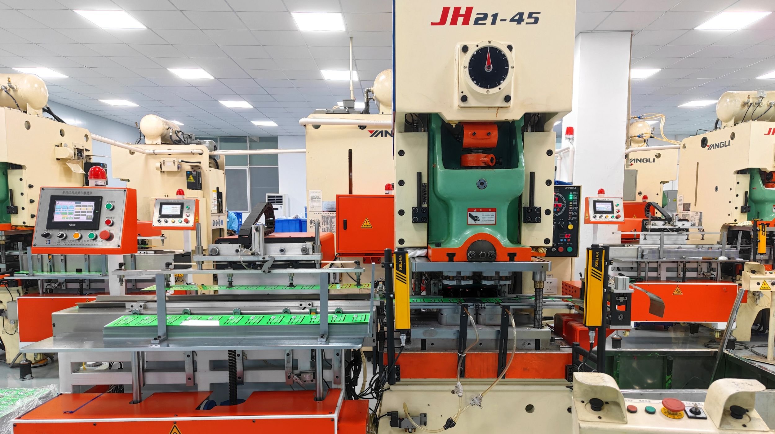A detailed shot of our JH21-45 pneumatic precision production line at MeiXinLong Packing, which features advanced, automatic controls for crafting our custom food tin boxes.
