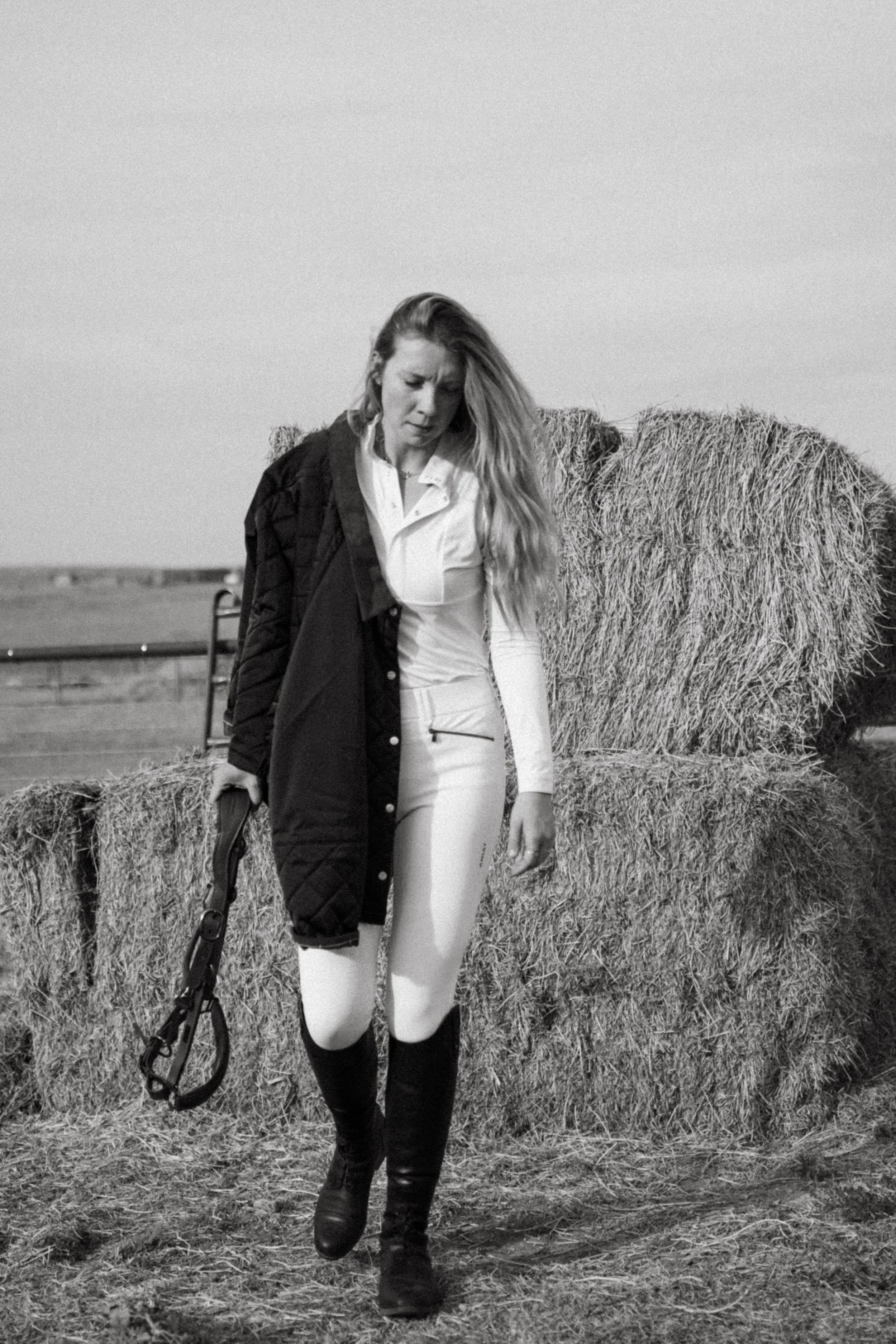 Equestrian portrait-style photographs featuring a woman with her horse in a beautiful outdoor setting, showcasing her riding style, equestrian lifestyle, and connection with her horse through natural, editorial-inspired imagery.