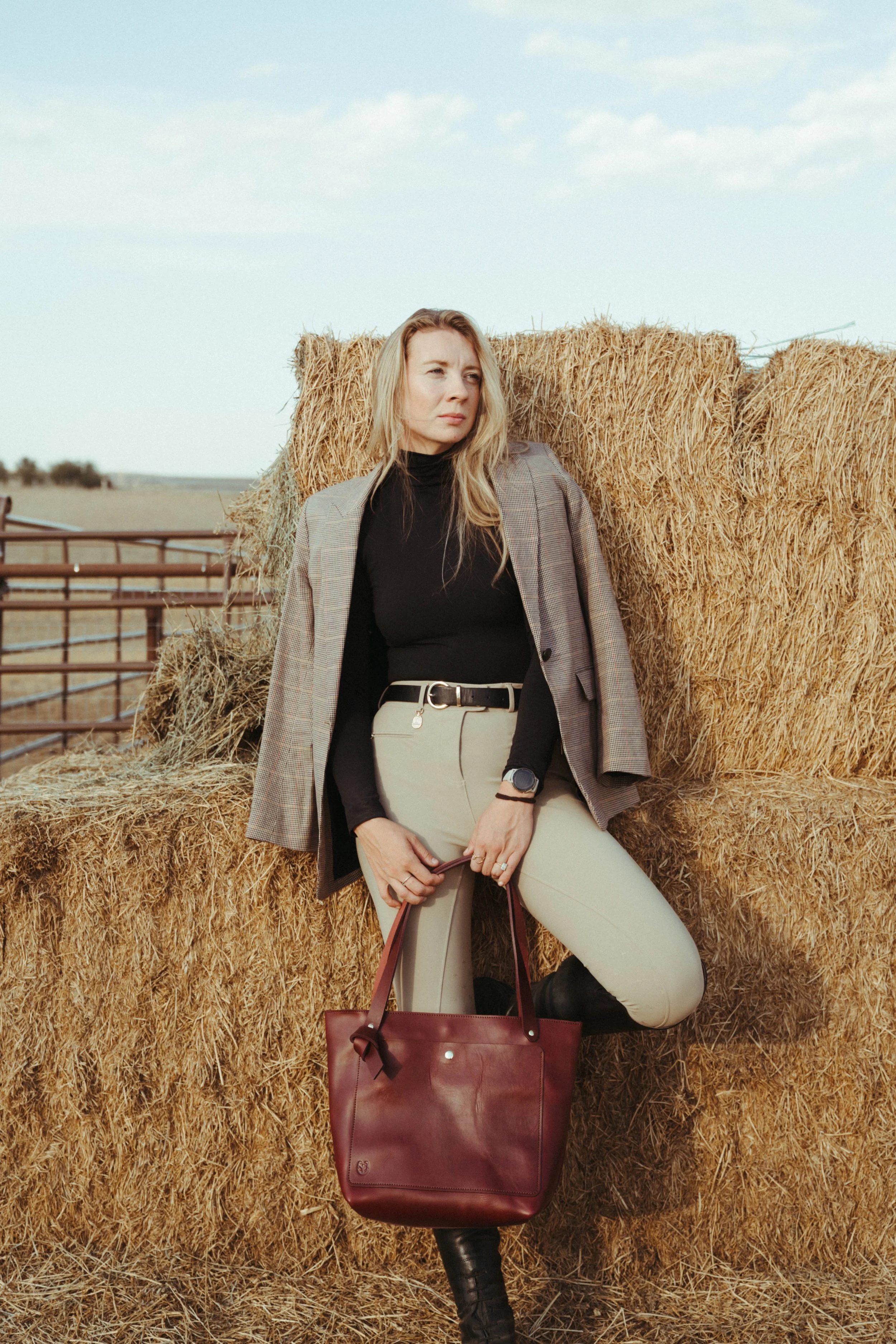 Equestrian portrait-style photographs featuring a woman with her horse in a beautiful outdoor setting, showcasing her riding style, equestrian lifestyle, and connection with her horse through natural, editorial-inspired imagery.
