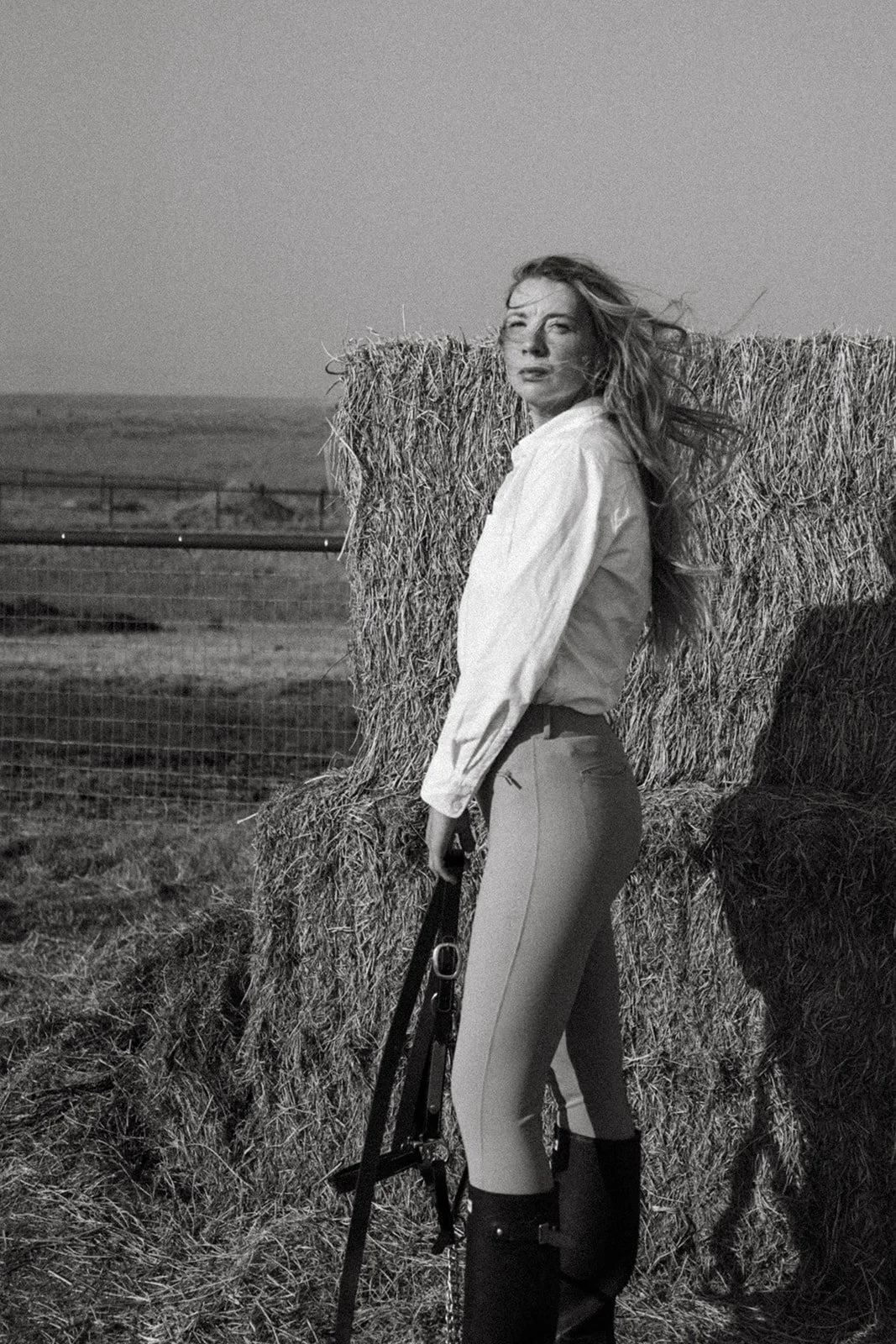 Equestrian portrait-style photographs featuring a woman with her horse in a beautiful outdoor setting, showcasing her riding style, equestrian lifestyle, and connection with her horse through natural, editorial-inspired imagery.