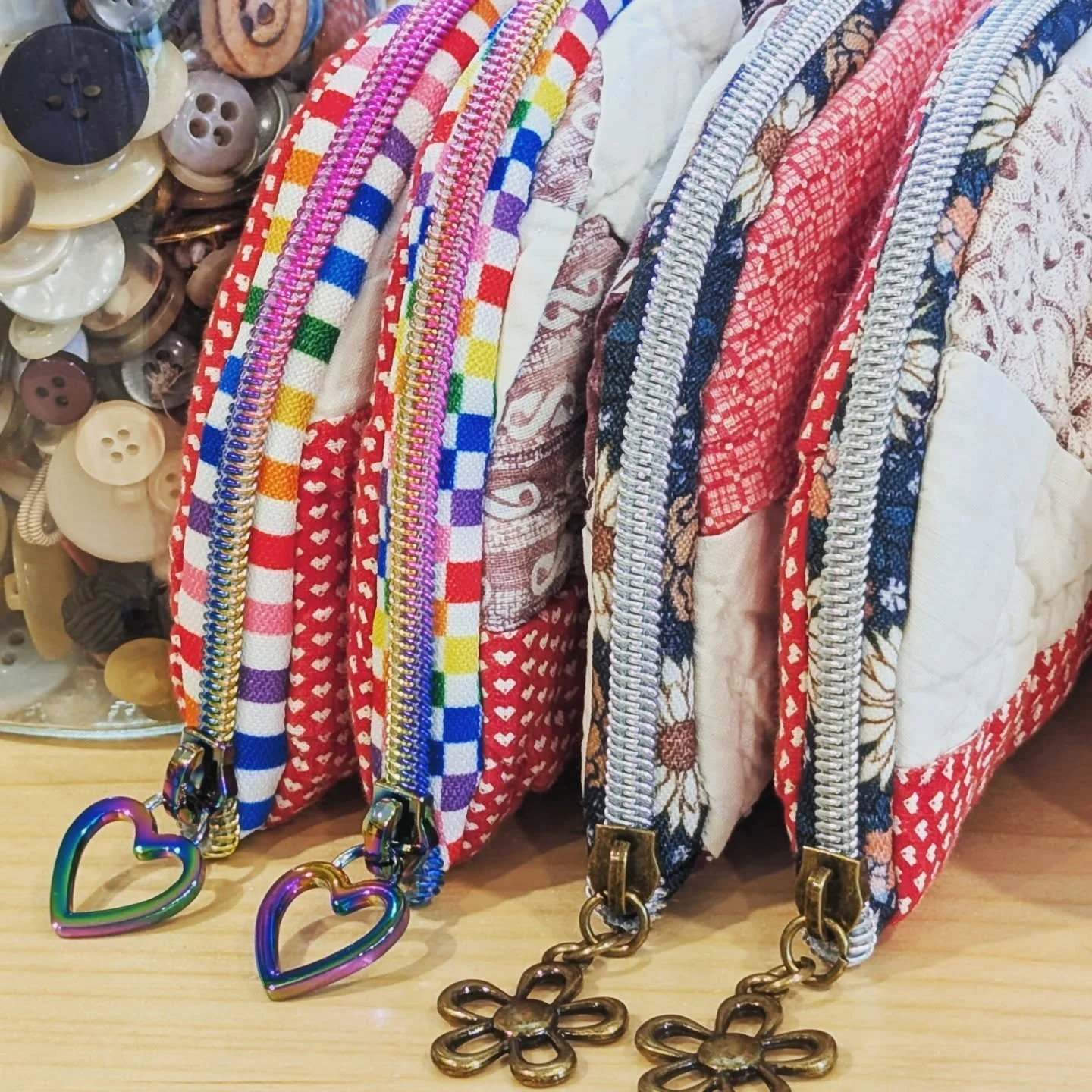 How many ways can we use vintage quilts?😍✌🏼 Perfect for sunglasses, corralling pens and pencils, or anything you have floating around in your bag. These won't last long this weekend, so get to the @mainstreetwoo Farmers' Market early this Saturday 