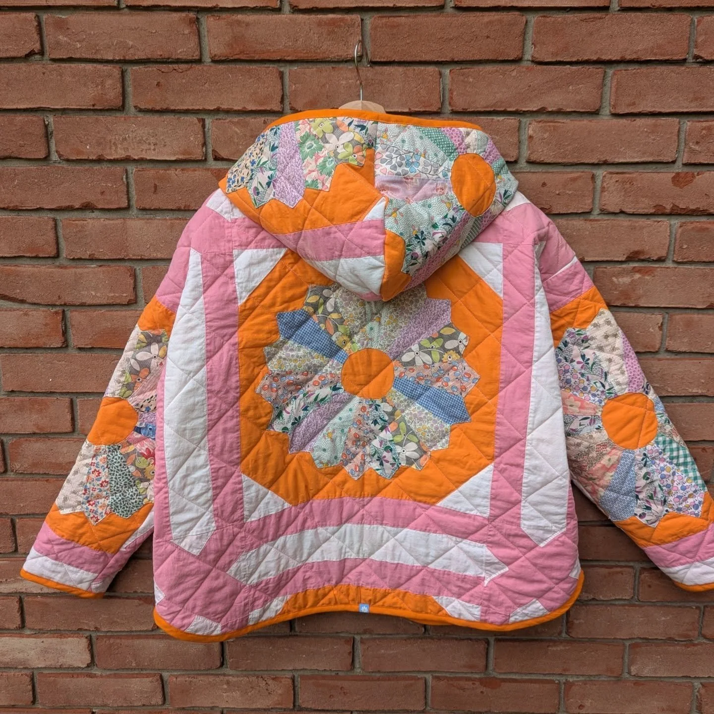 From vintage quilt top to custom quilt jacket!🩷🧡 This one is claimed, but message me if you are interested in your own one of kind cozy coat!💙