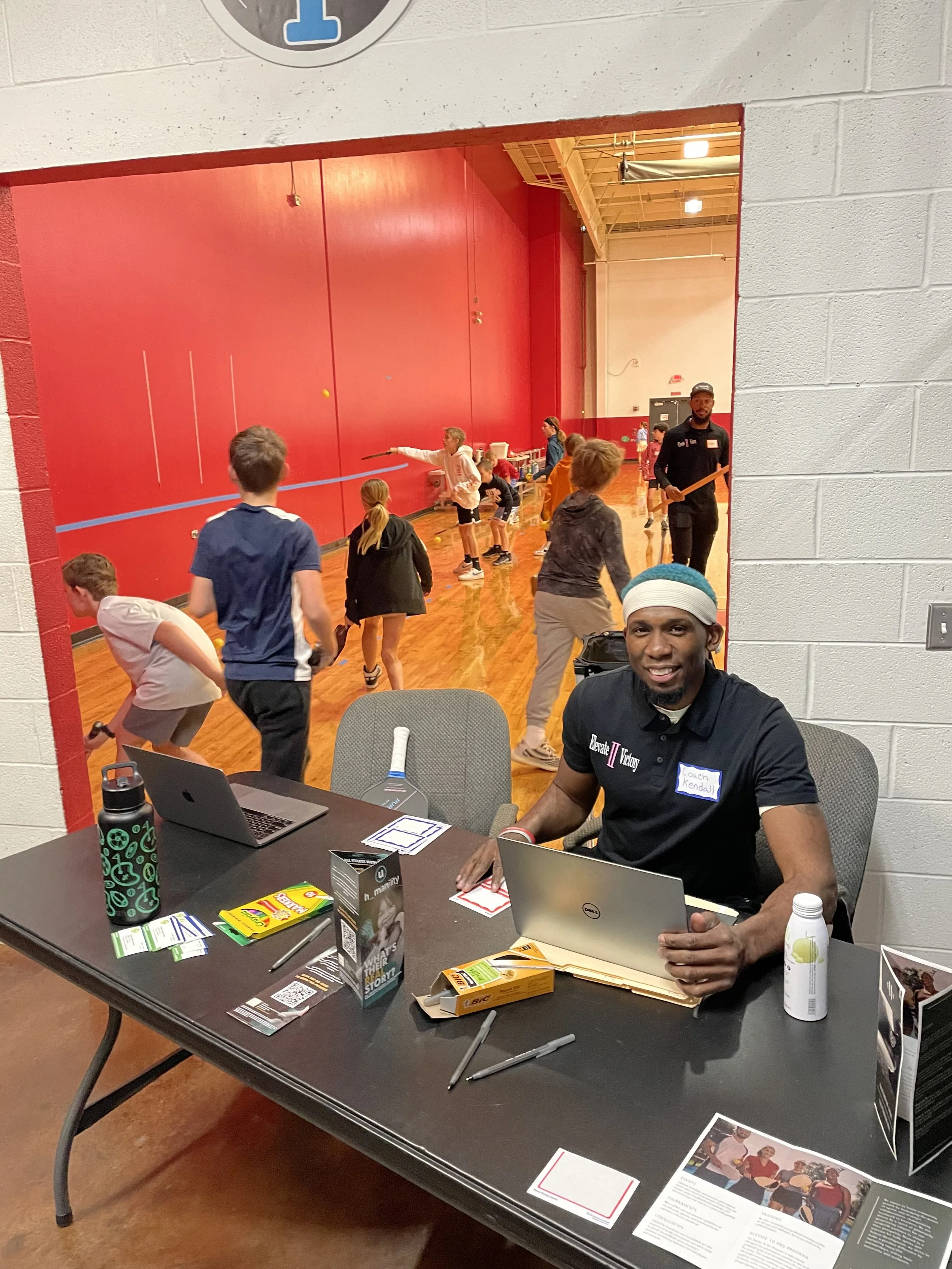 Coach Kendall welcoming campers