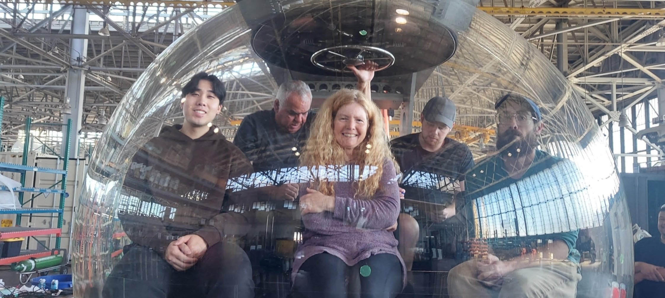 This submersible was designed and built by DOER of Alameda, Ca. Liz Taylor, President of DOER, is pictured, center.