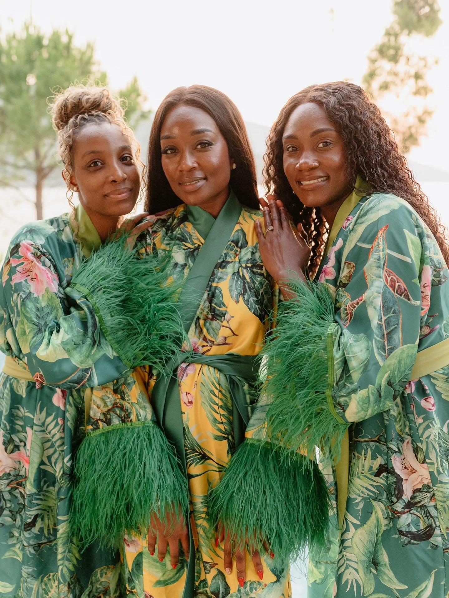 Tropical mornings, feathered sleeves, and women who shine brighter than the sun🌞