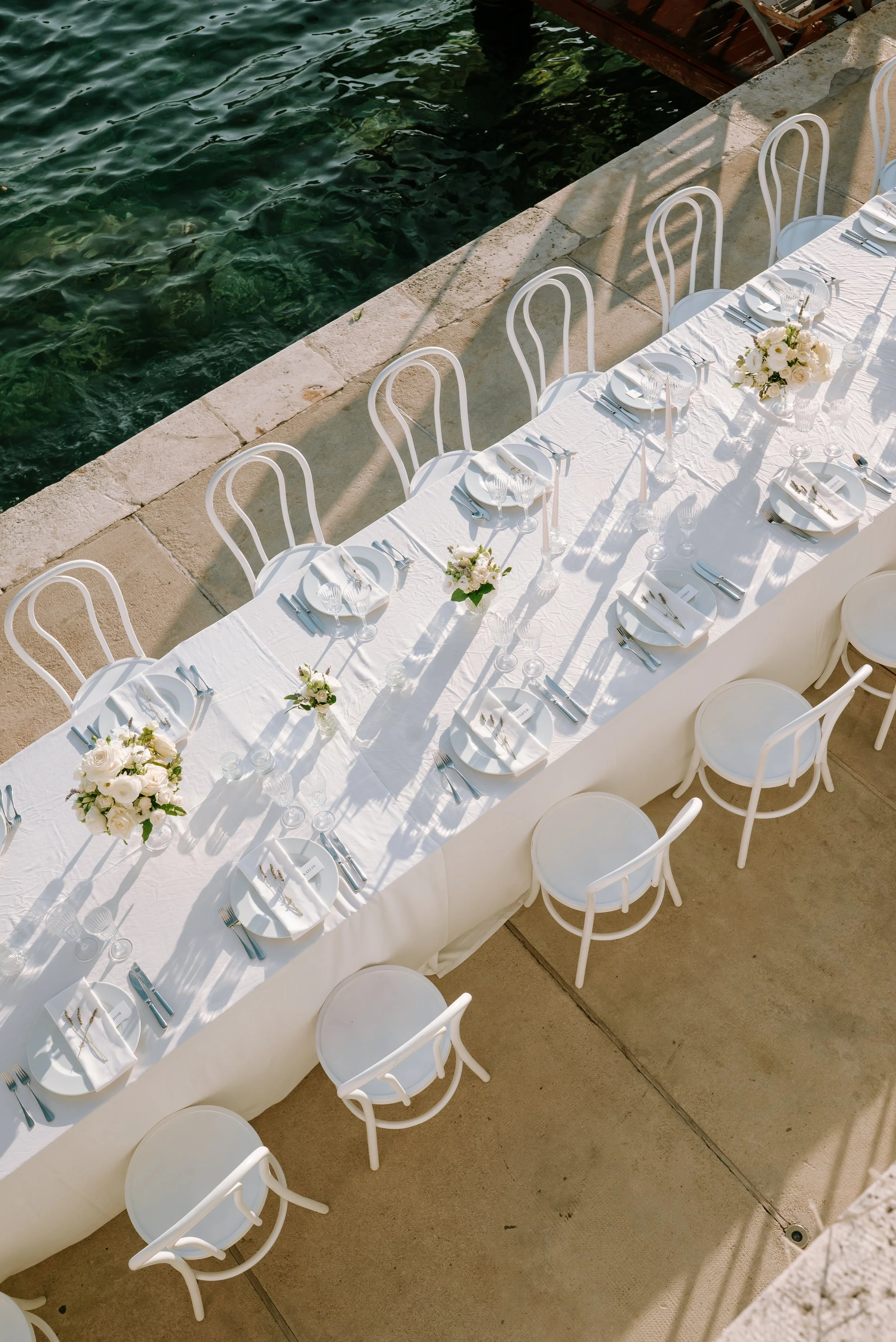 Reborn Weddings Hvar Wedding Photographer captured a Dinner Setting at Beach Club Hvar