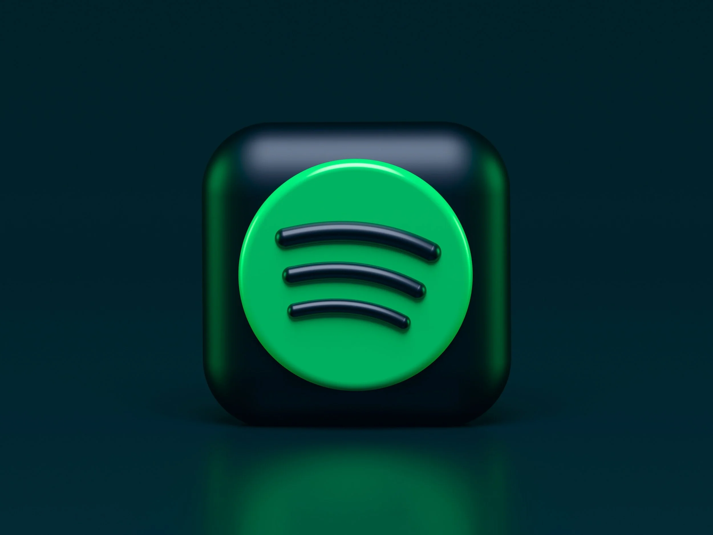 3D illustration of the Spotify logo with a black circular background and green circle with black curved lines in the center