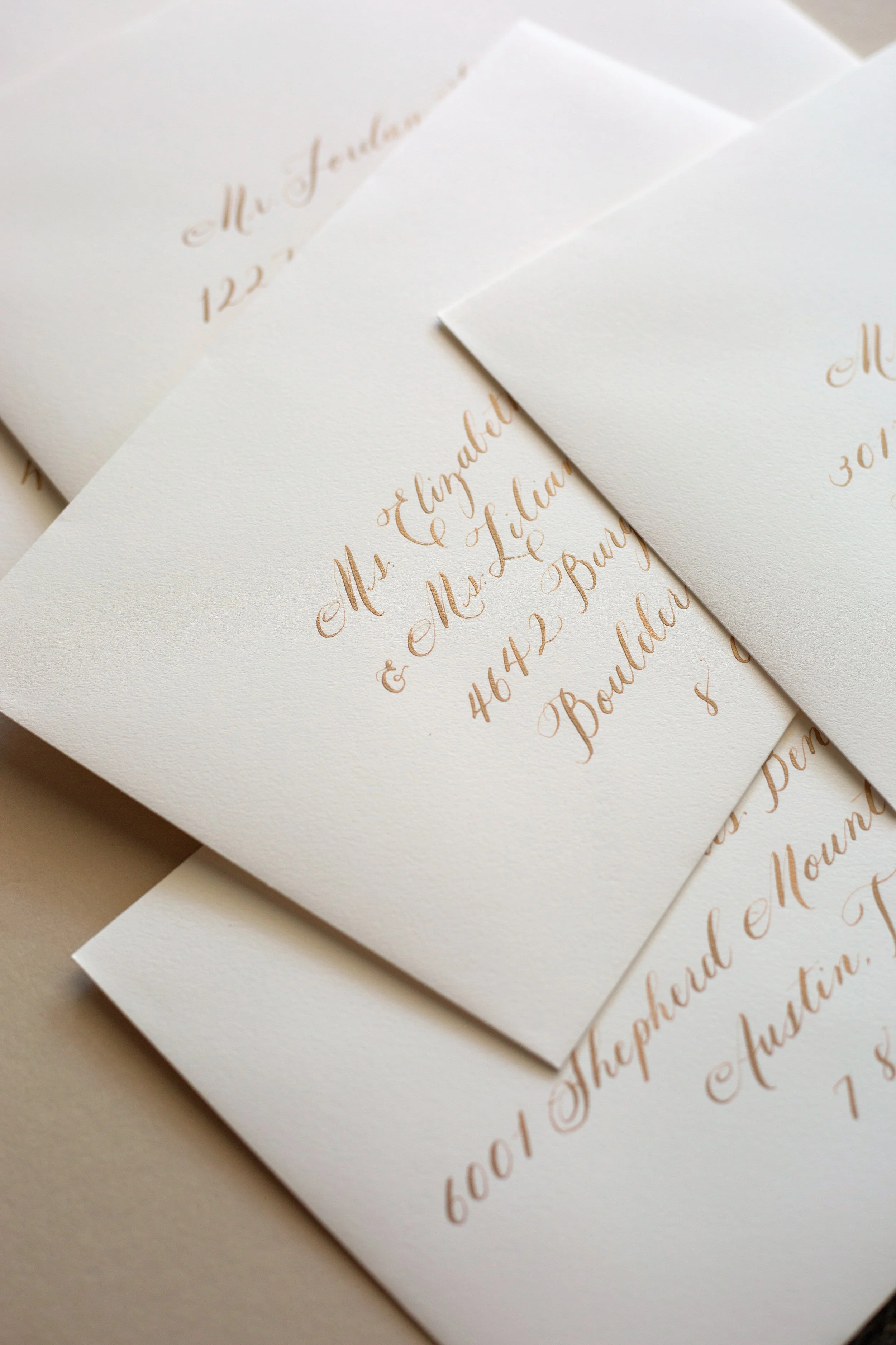hand addressed envelopes make the finishing touch for wedding invitation suite