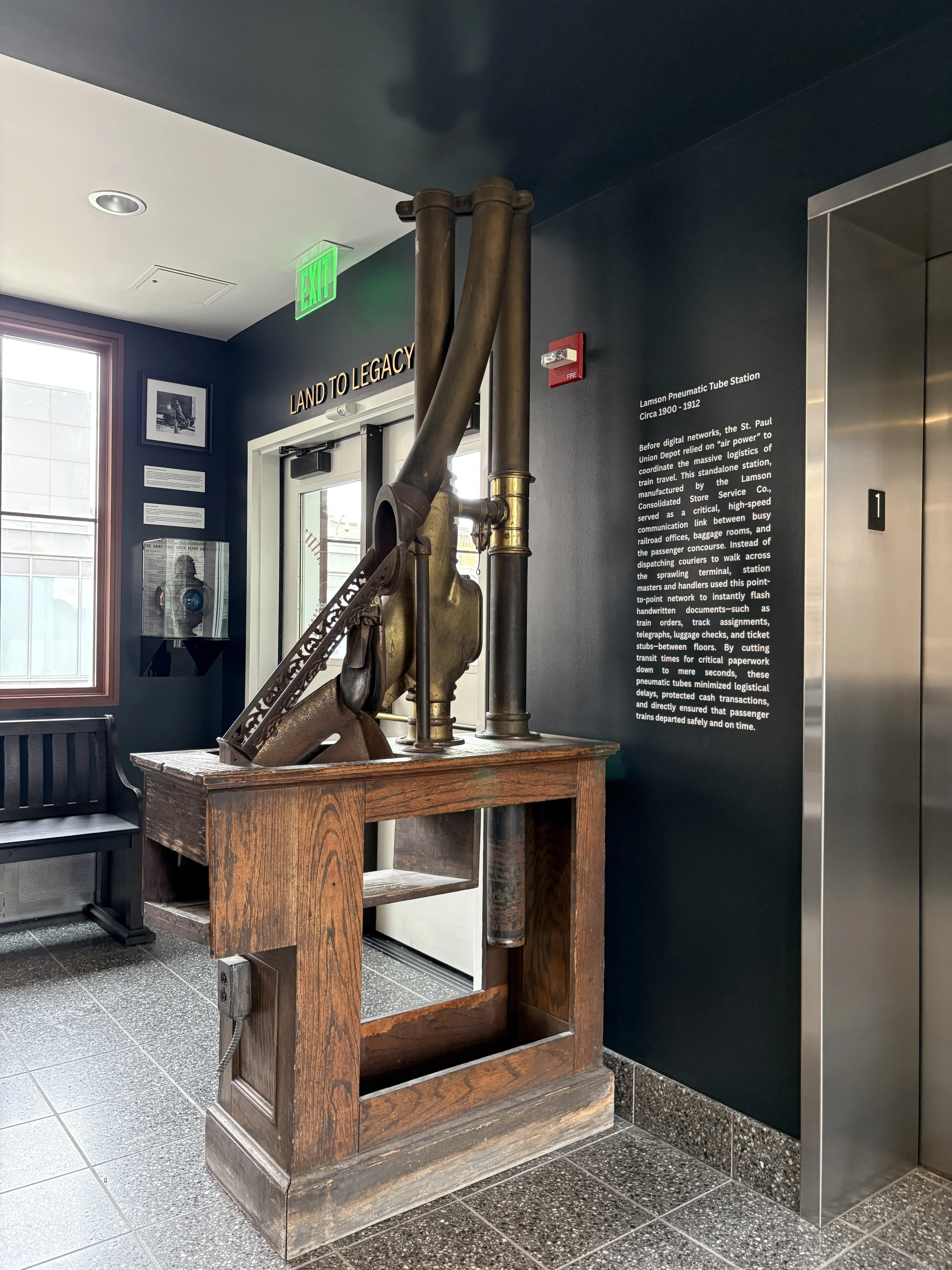 Historic Stair Museum at Union Depot in Saint Paul, Minnesota, featuring a restored Lamson pneumatic tube station, historic artifacts, and interpretive exhibit design curated by West Design.