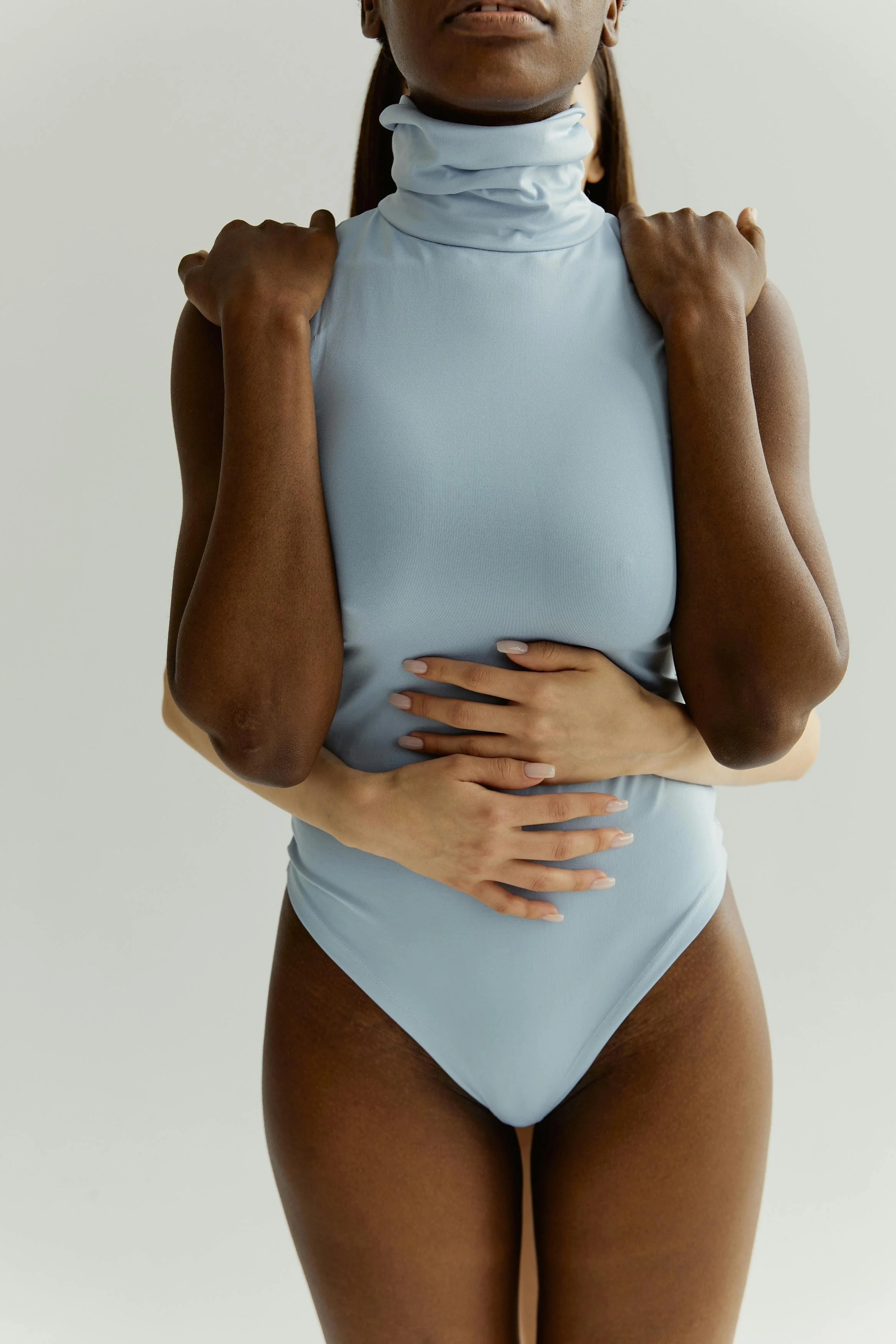 The Gut Brain Axis Highway Between Microbiome and mind image of 2 woman connected by their arms root cause healing with Nik Heartsong Winged Heart healing