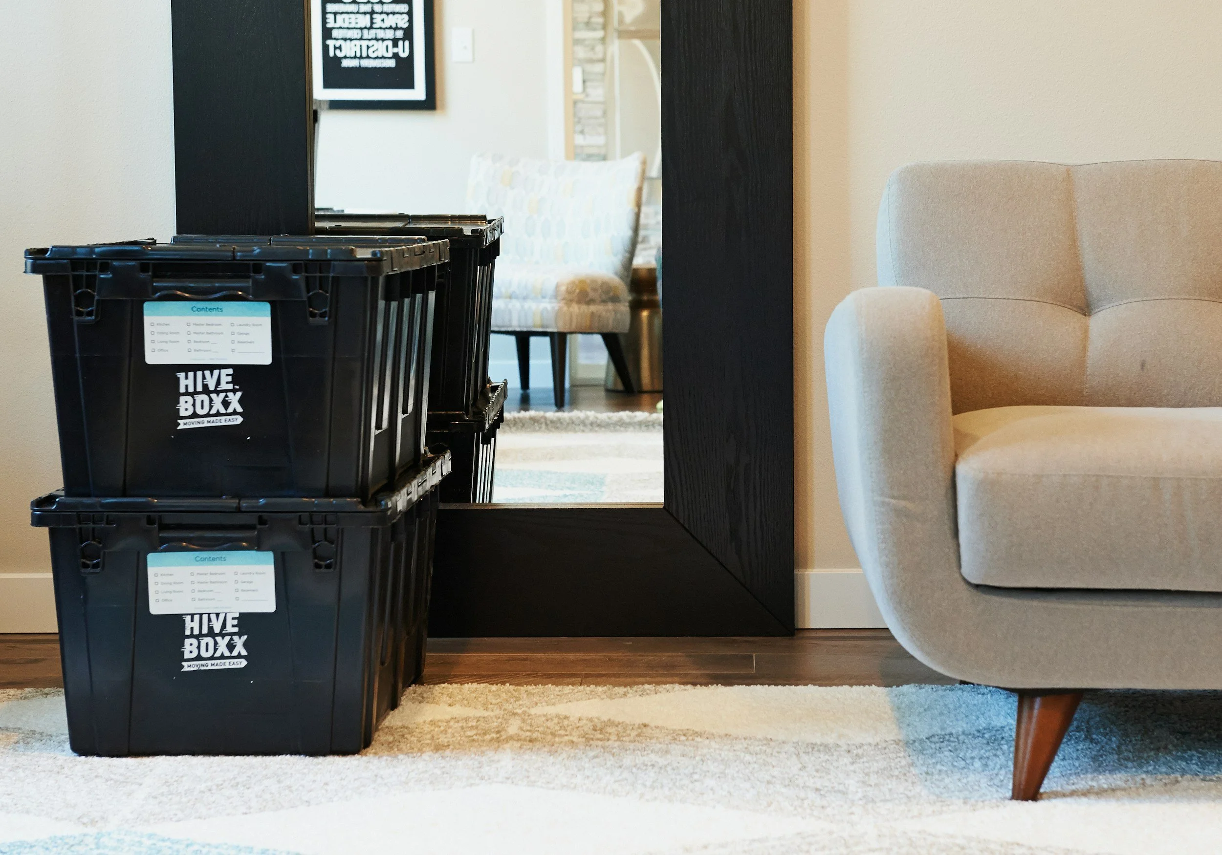 Stacked storage bins to keep items that are maybe for next season. Elevated Spaces provides decluttering and organizing services to Concord, NH and surrounding areas to help you decide what needs to leave your kitchen, pantry, basement, closet.