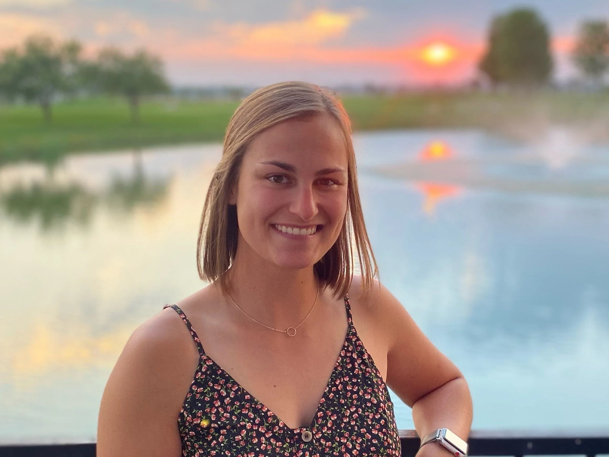 Photo of Alyssa Corcoran owner of Elevated Spaces providing decluttering and organizing services to home in Concord, NH and surrounding areas working on closets, basements, pantry, toy room, garage.