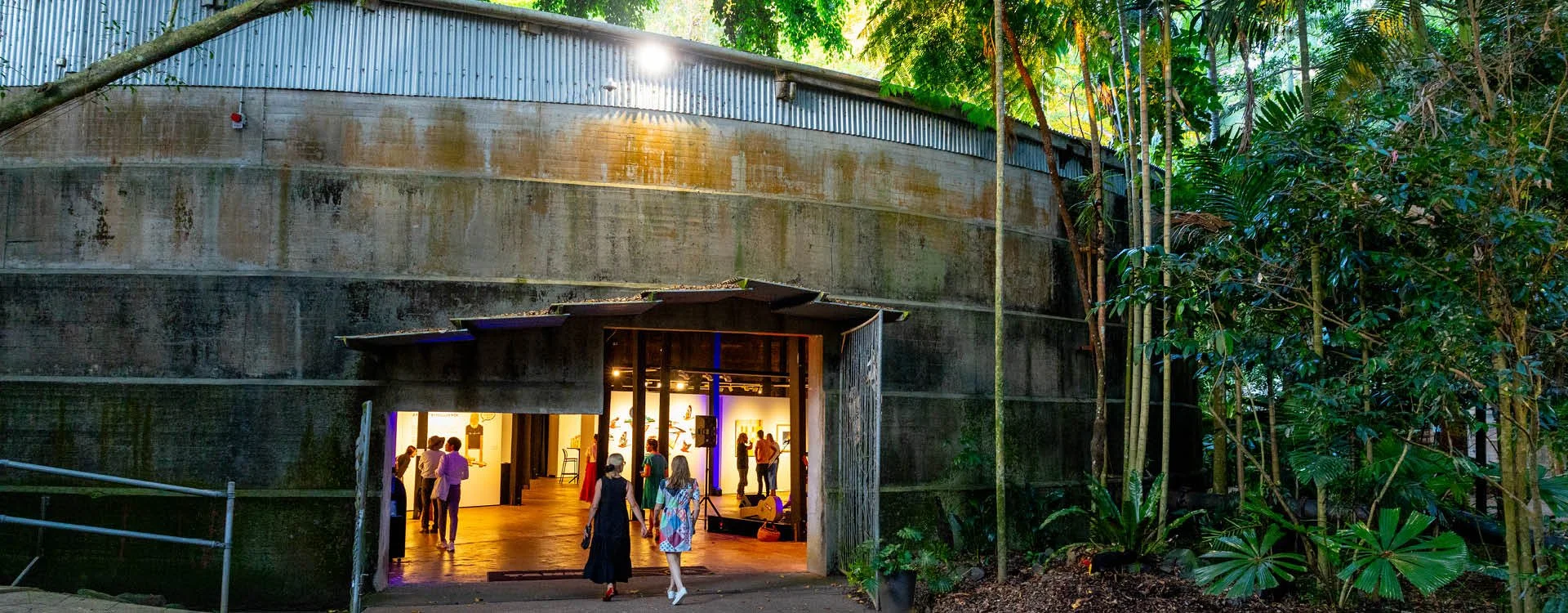 People entering Tank 4 at Tanks Arts Centre in Cairns.