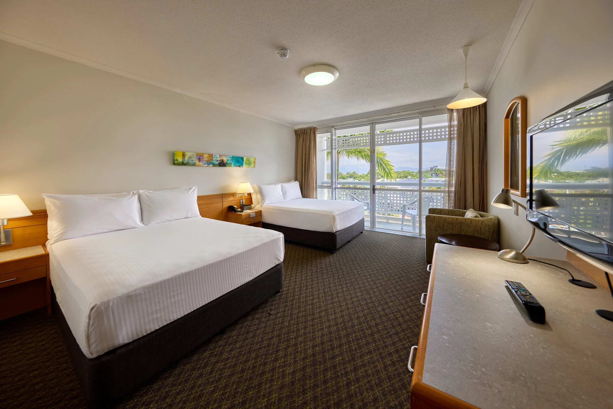 Two double beds overlooking a balcony  (2).jpg