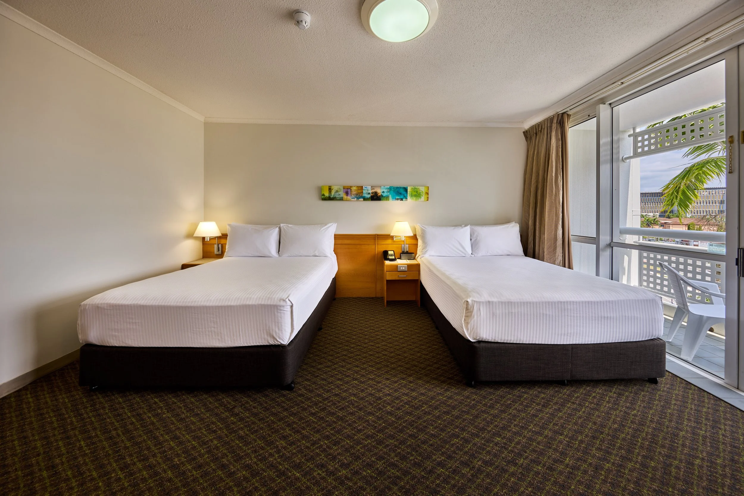 Two double beds overlooking a balcony  (5).jpg