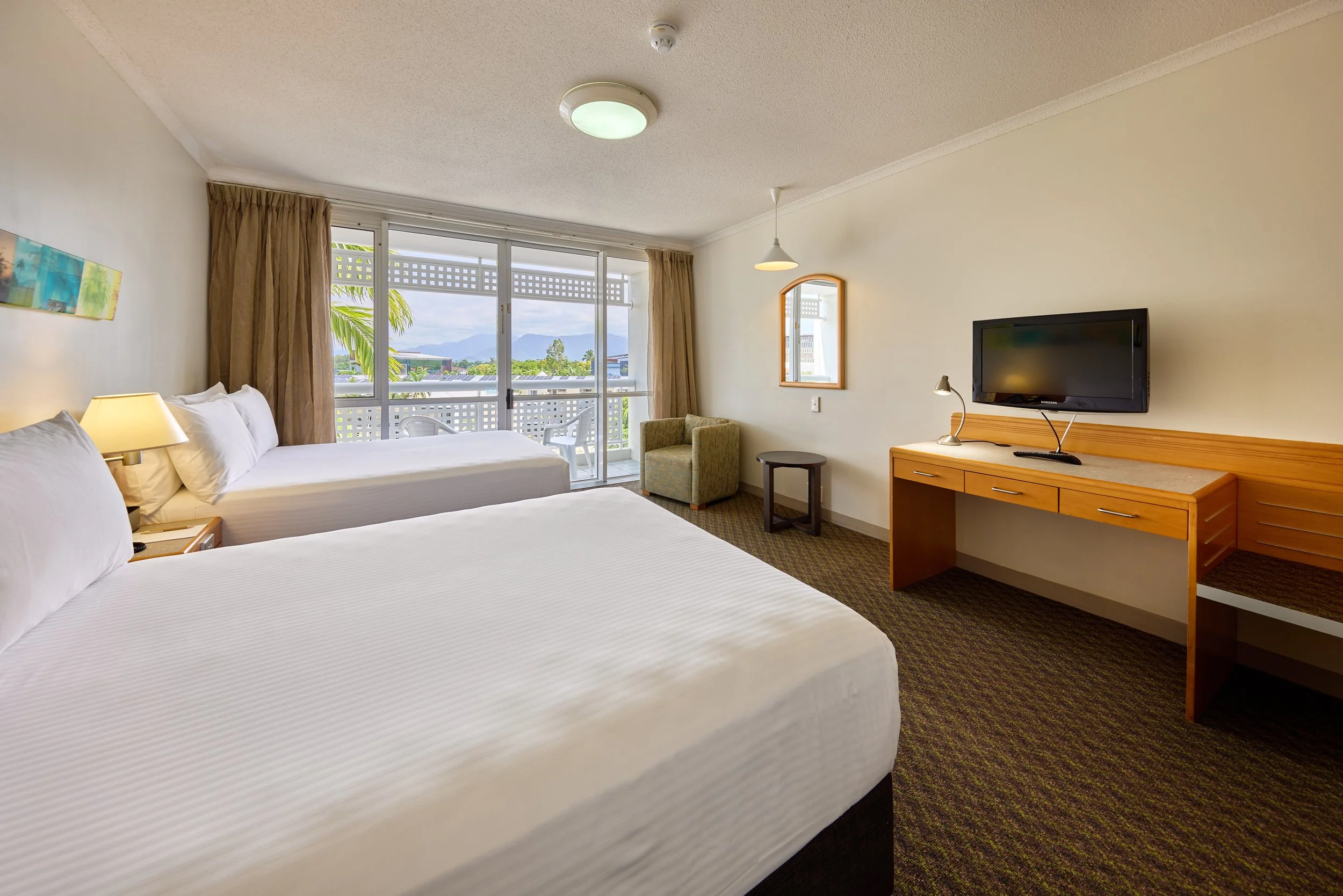 Two double beds overlooking a balcony  (7).jpg