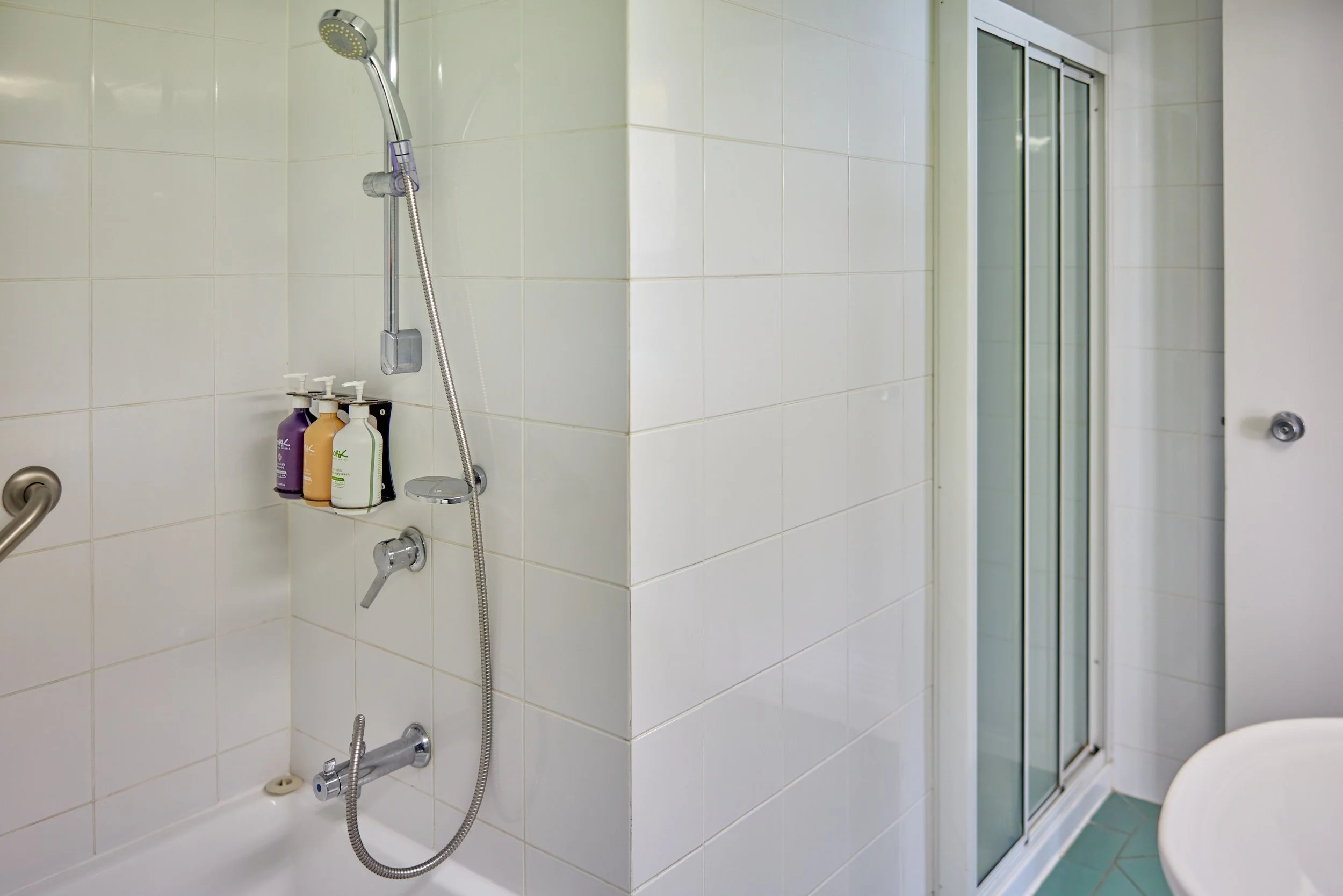 Bathroiom with separate bath tub and shower.jpg