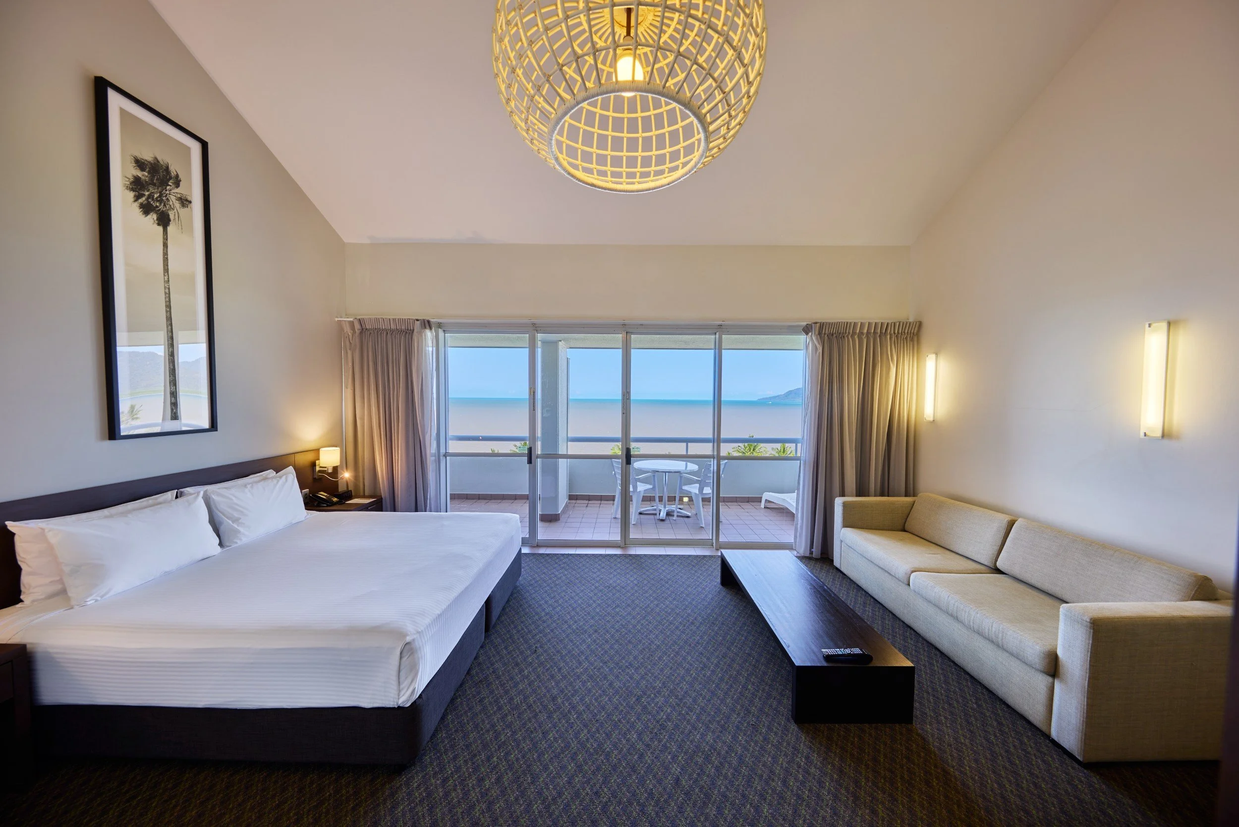 King bed overlooking large private baclony and sea front views.jpg